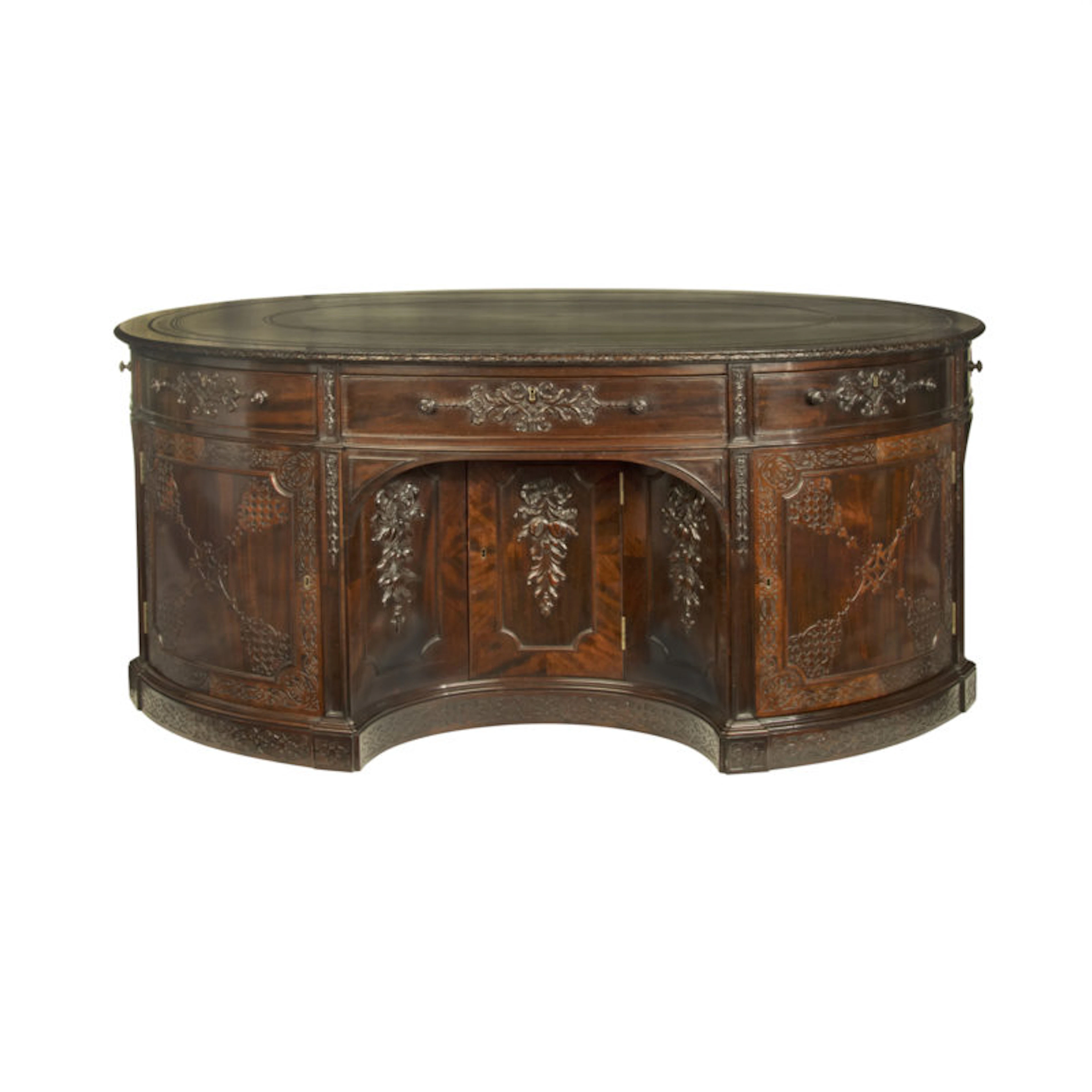 A very large mahogany centrepiece partners’ desk in the Chippendale