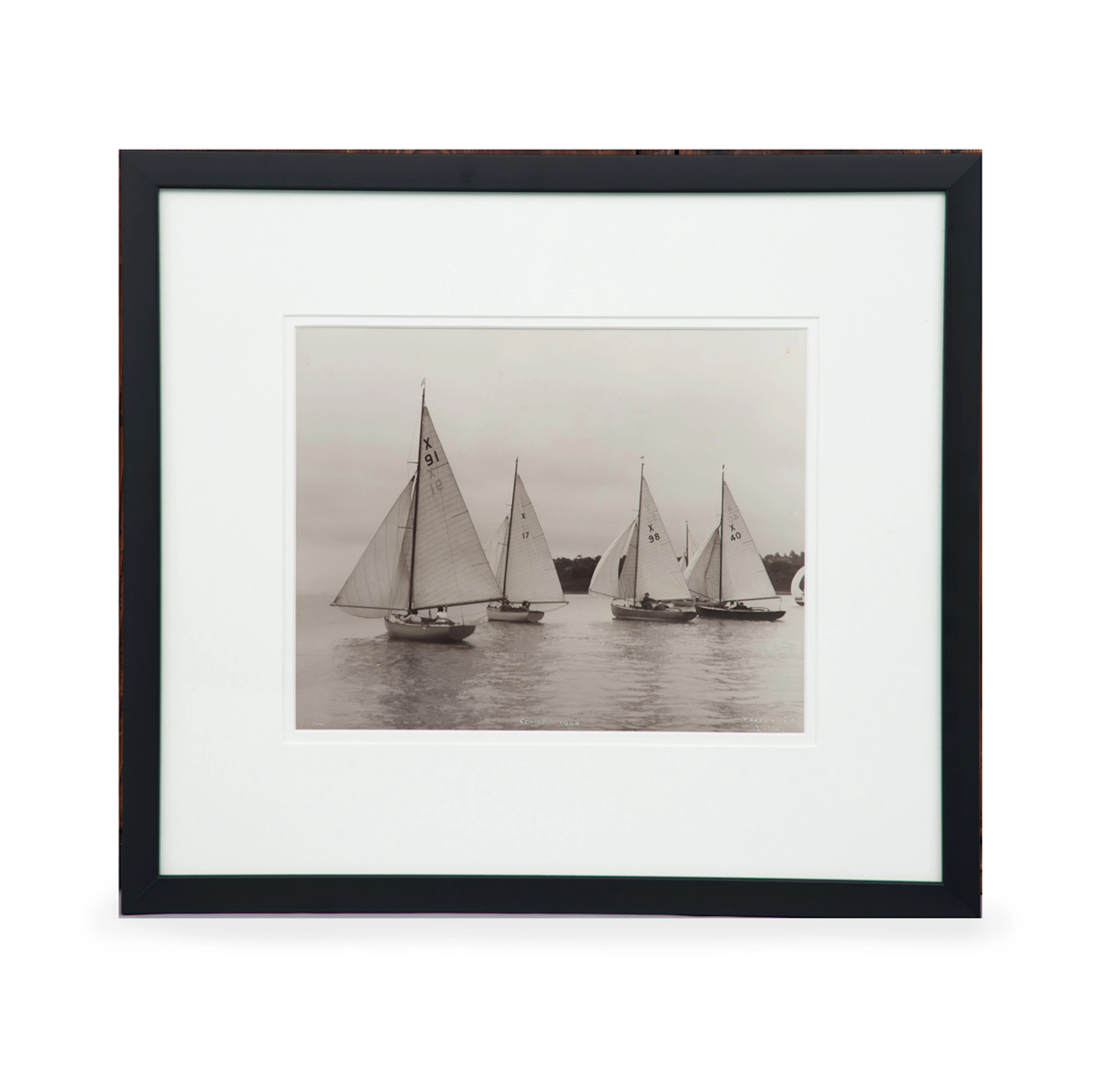 A gelatine print of boats in light airs sailing in the 1954 Cowes regatta