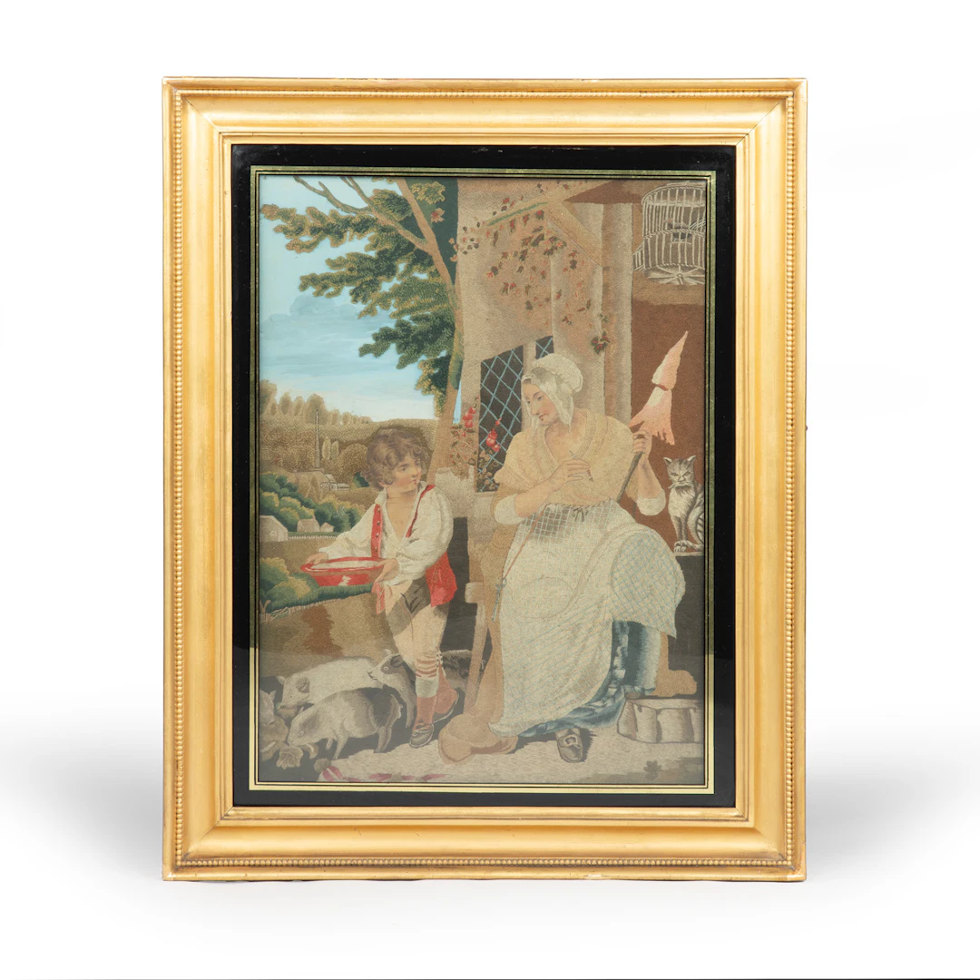 A fine Regency silkwork picture of The Industrious Cottage Wife after