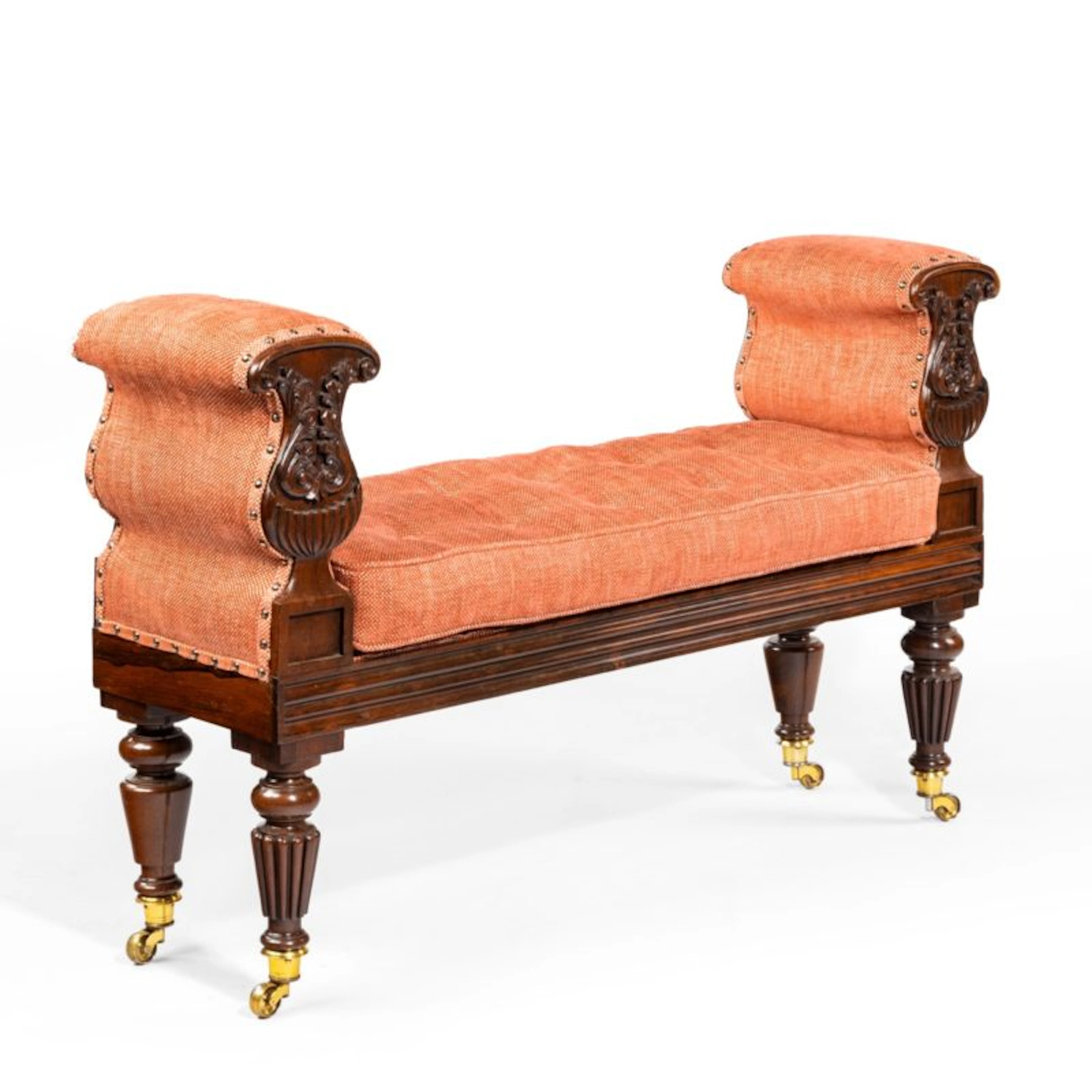 A late Regency rosewood window seat, in the manner of George Oakley