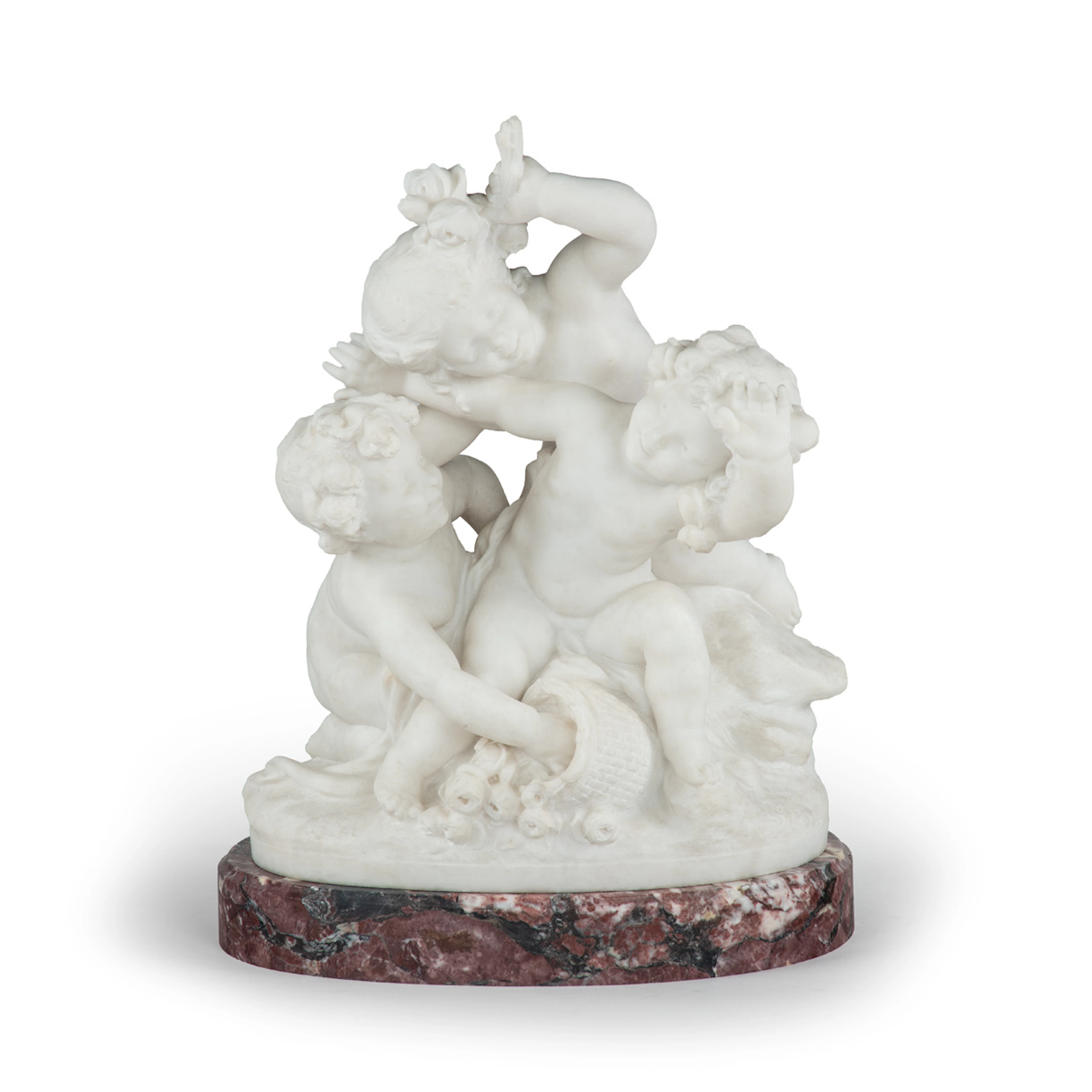 A large white marble figural group depicting three putti, Charles