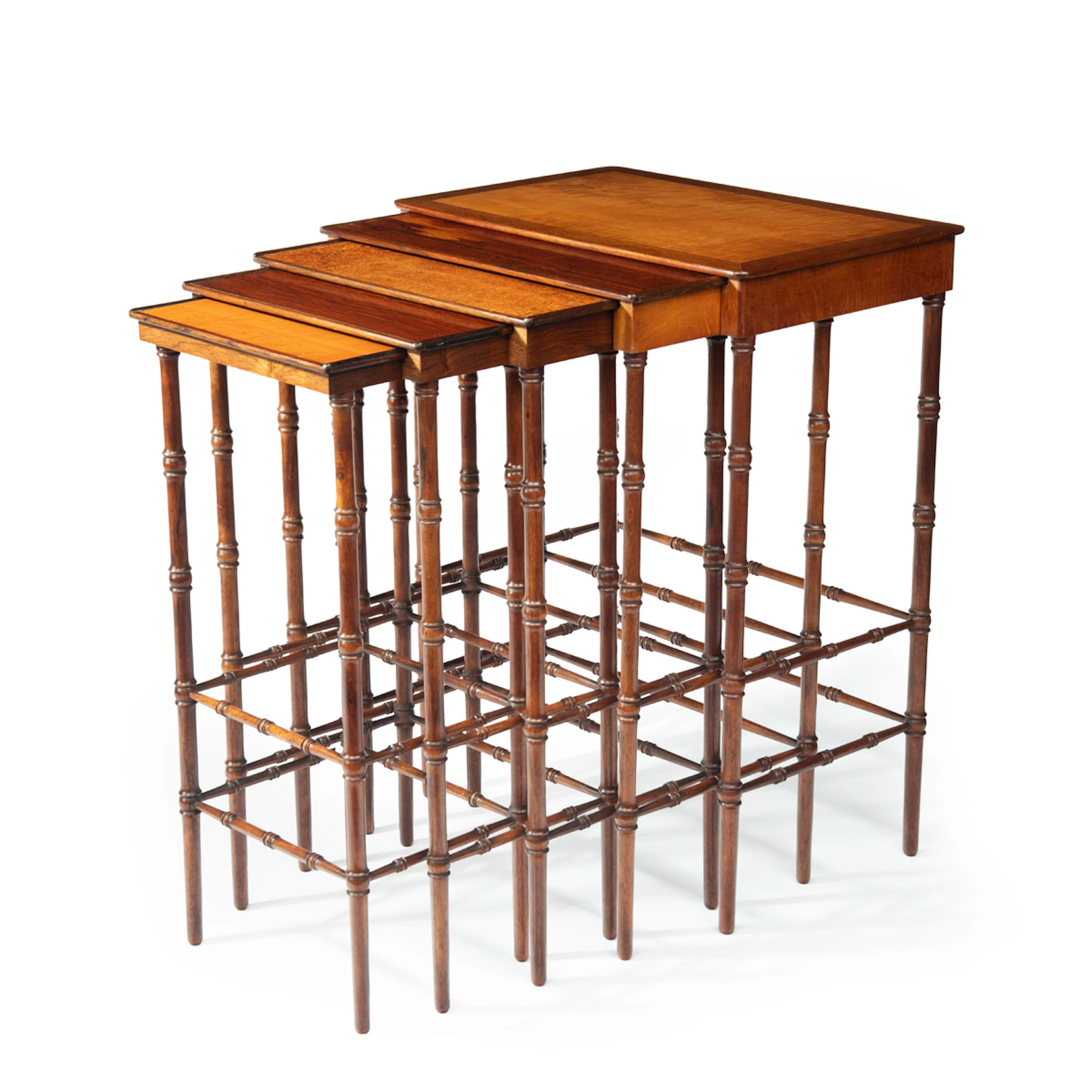 A nest of five Regency specimen wood tables attributed to Gillows