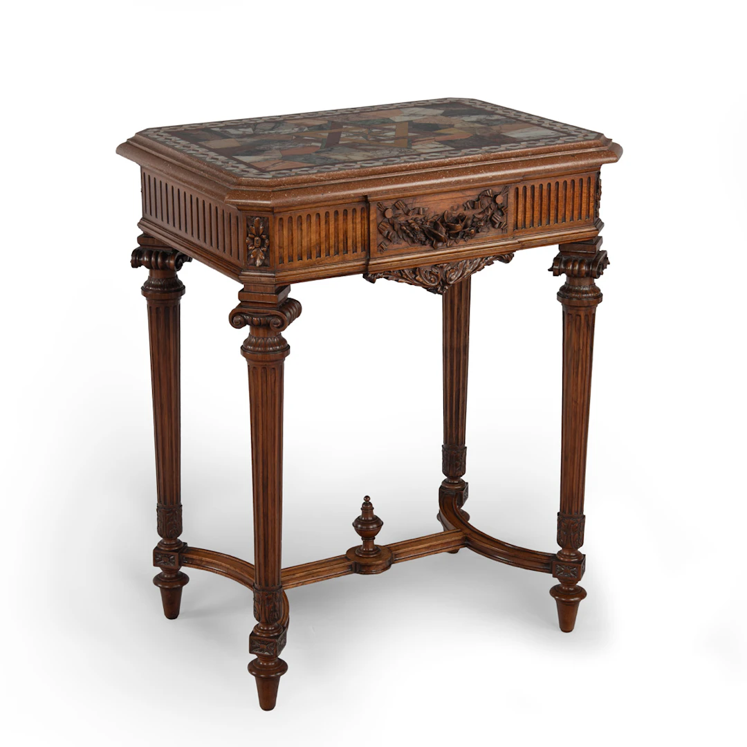 An unusual early 20th century walnut Lyon-Made table supporting an
