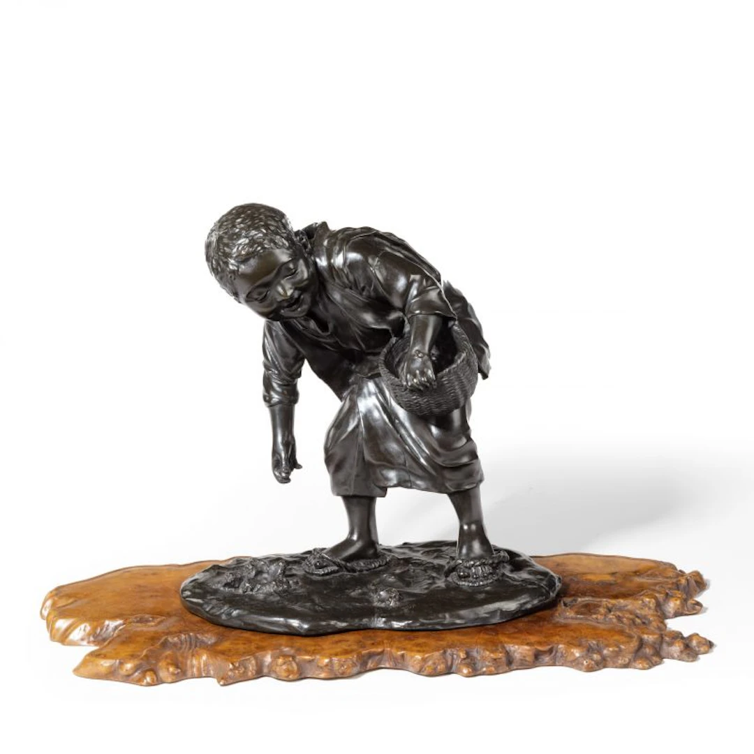 19th Century Meiji Period Bronze of a Boy Collecting Sweet Chestnuts by Seiya