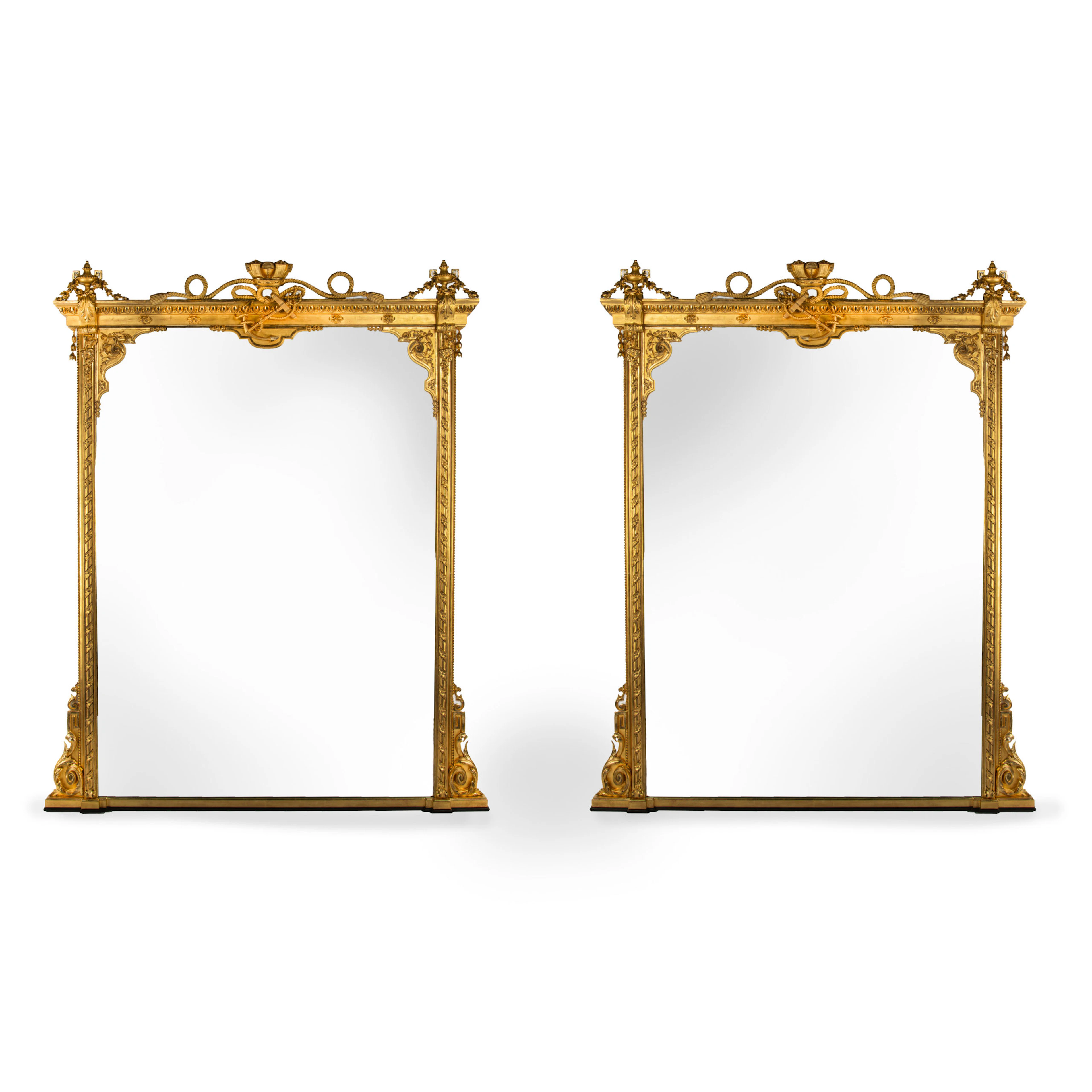 A Fine Pair of Giltwood Overmantel Mirrors with the Emblems of the
