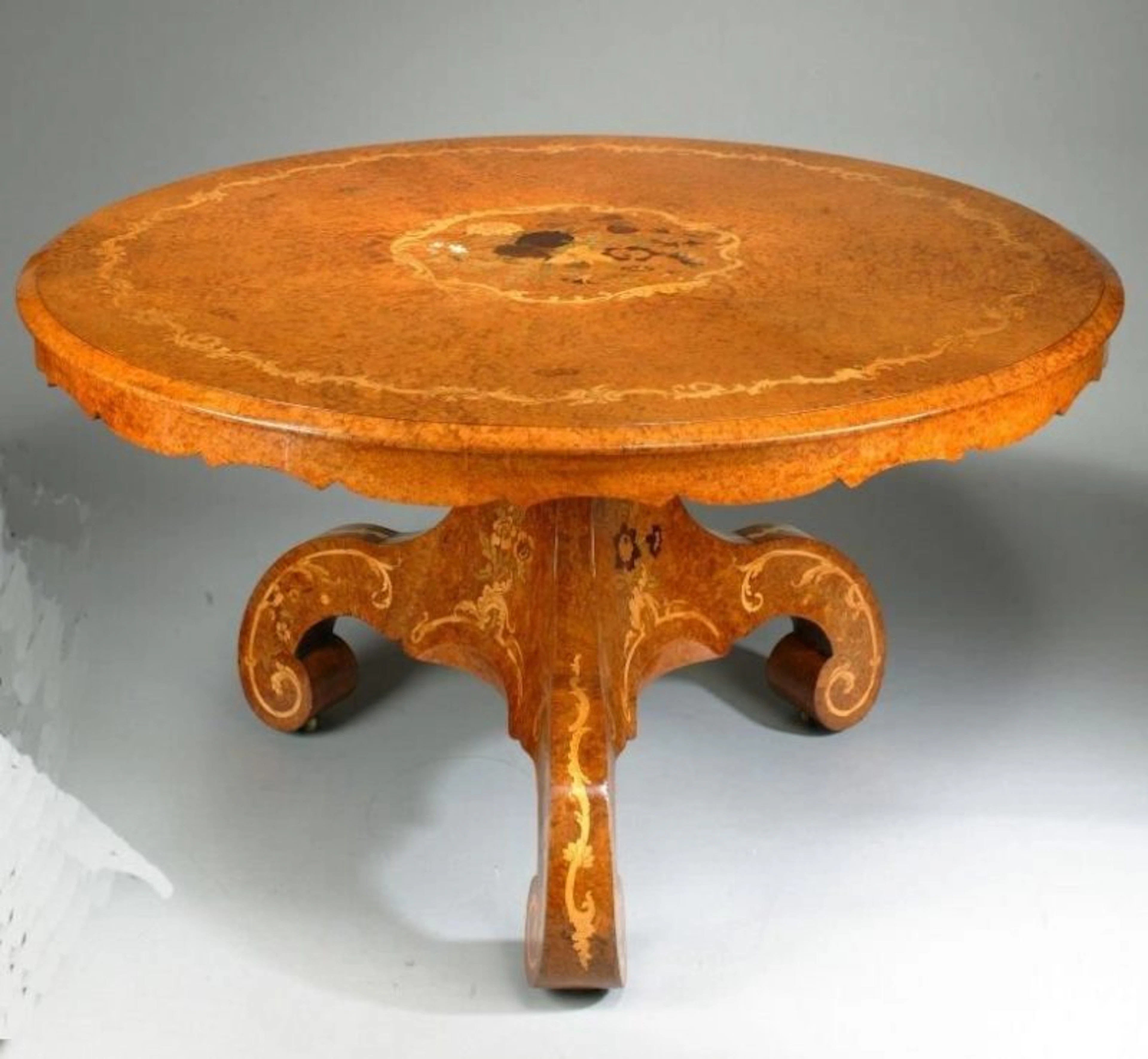 Regency amboyna centre table, attr. to E H Baldock