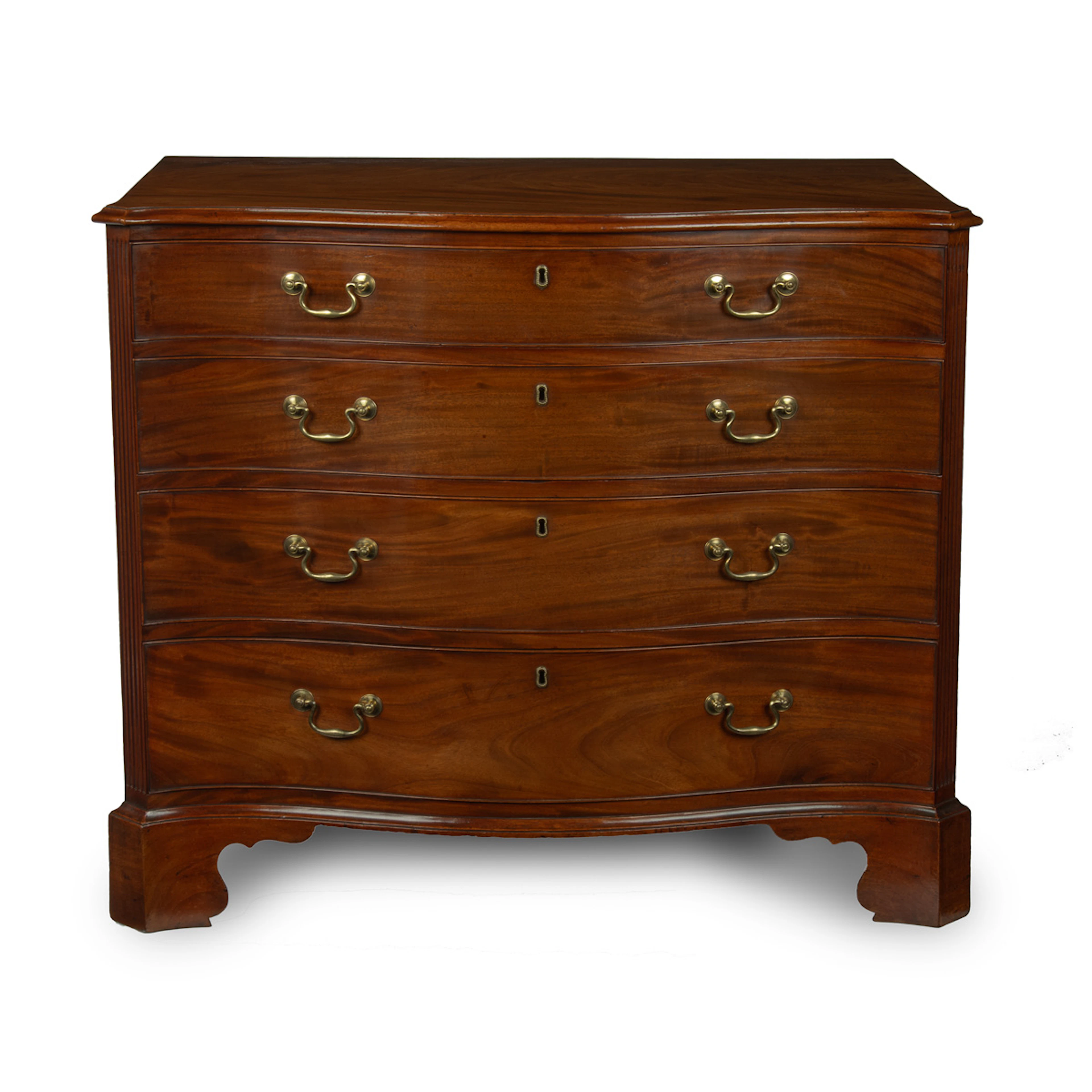 A mahogany four-drawer serpentine chest of drawers