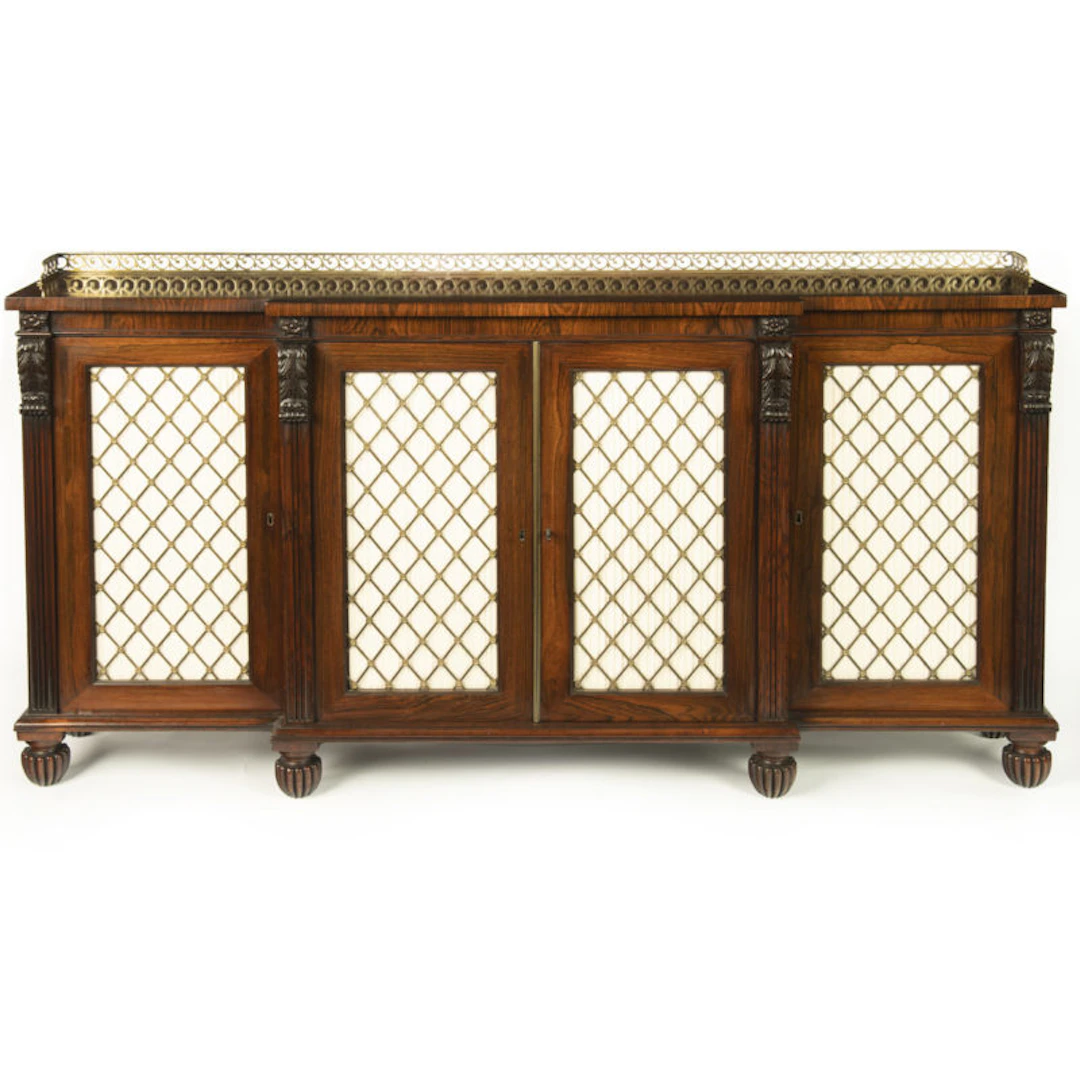 A late Regency rosewood breakfront four door side cabinet, attributed