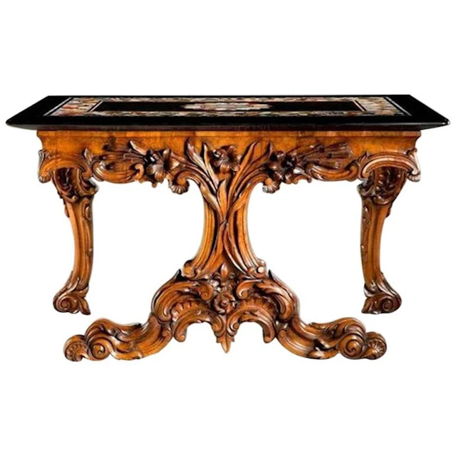 A walnut table with an Ashford marble top by Tudsbury of Edwinstowe