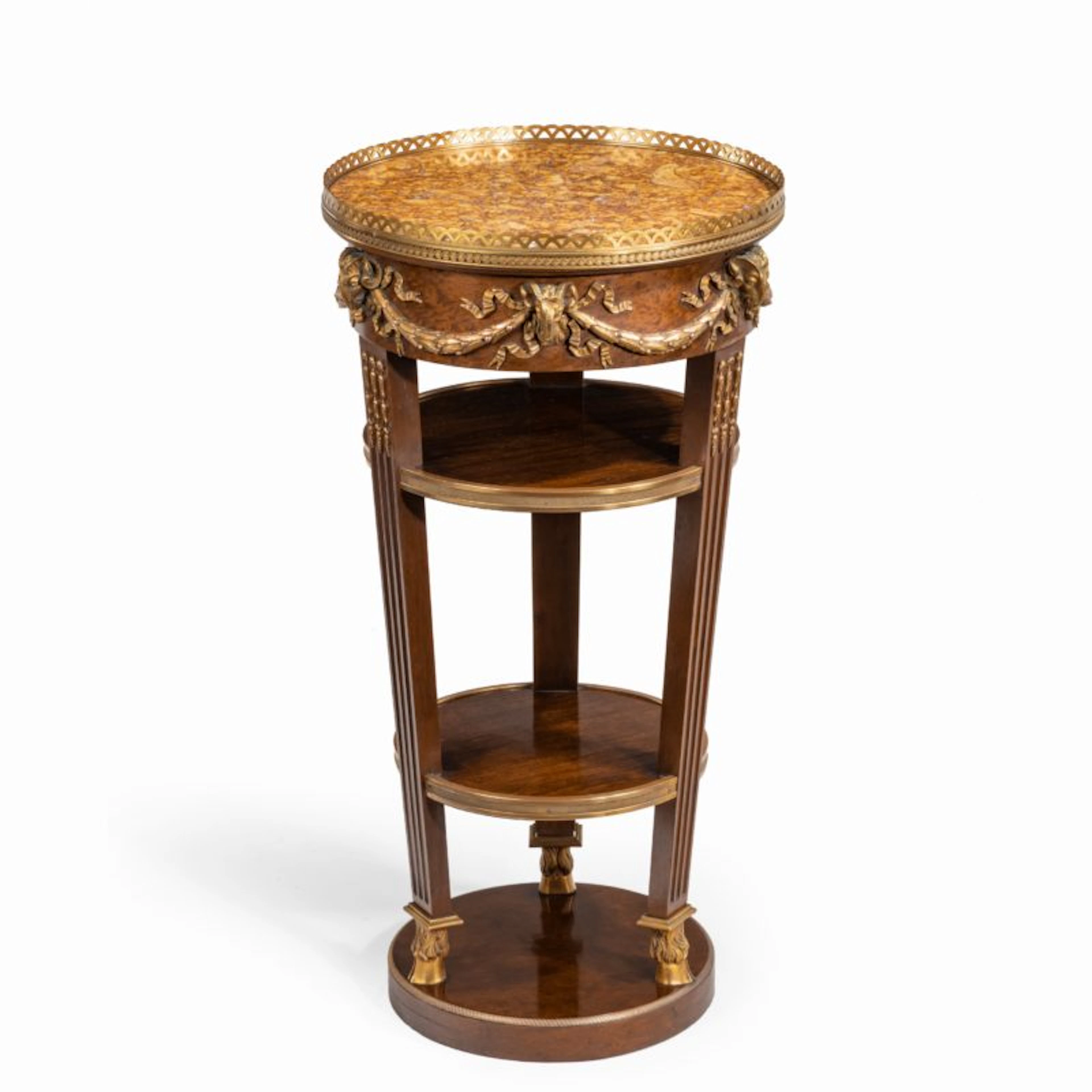 A circular mahogany gueridon in manner of Zwiener