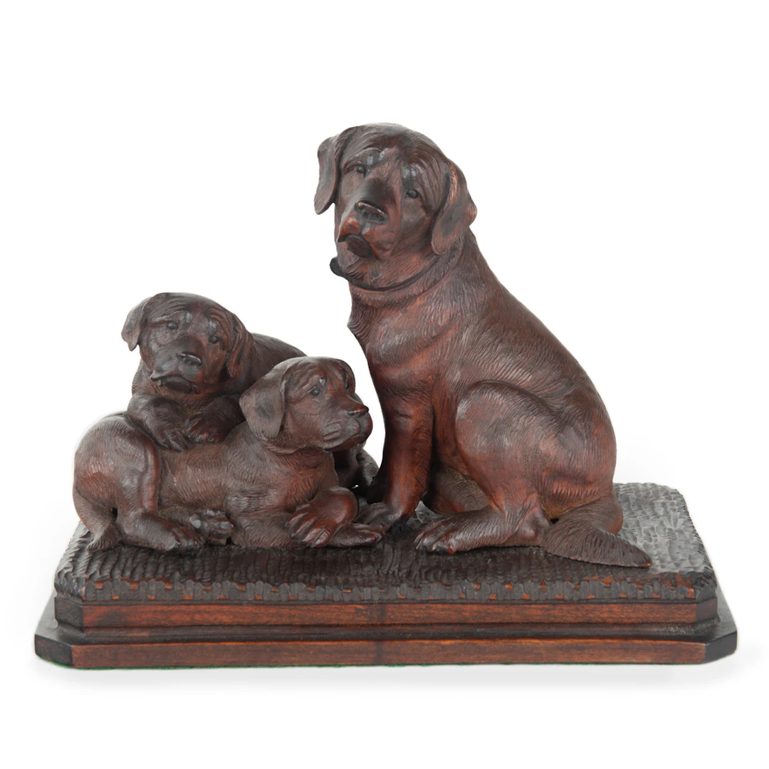 A charming late 19th century Black Forest carved limewood (linden