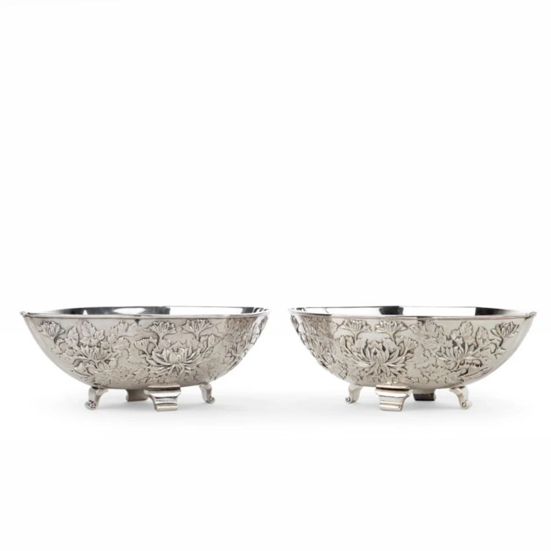 A pair of Meiji period solid silver bowls by Eigyoku