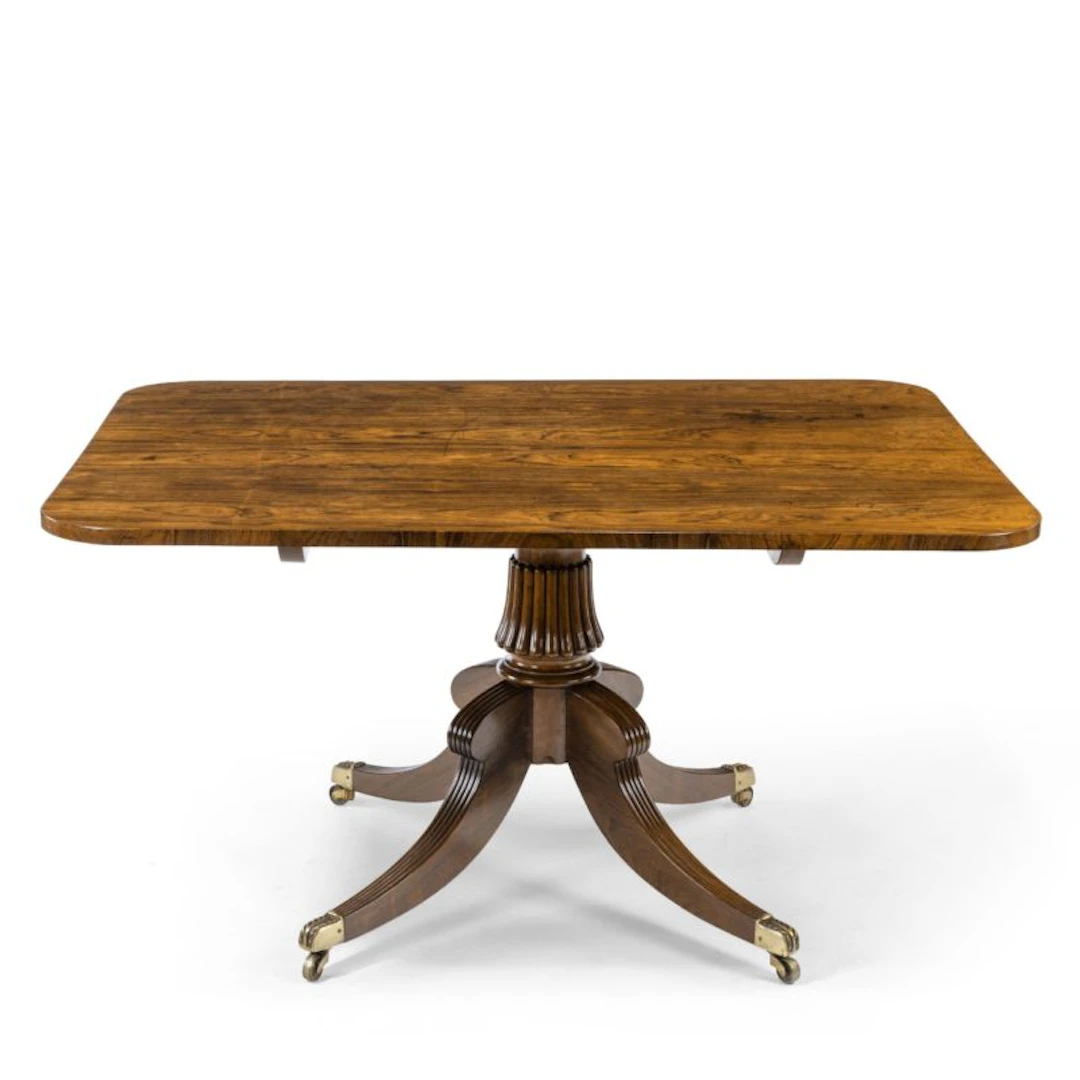 A Regency rectangular rosewood tilt-top table attributed to Gillows