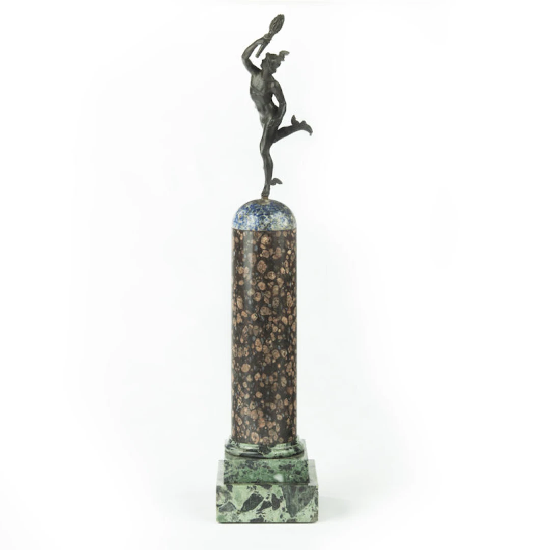 A Grand Tour Regency bronze figure of Mercury (Hermes) on a composite