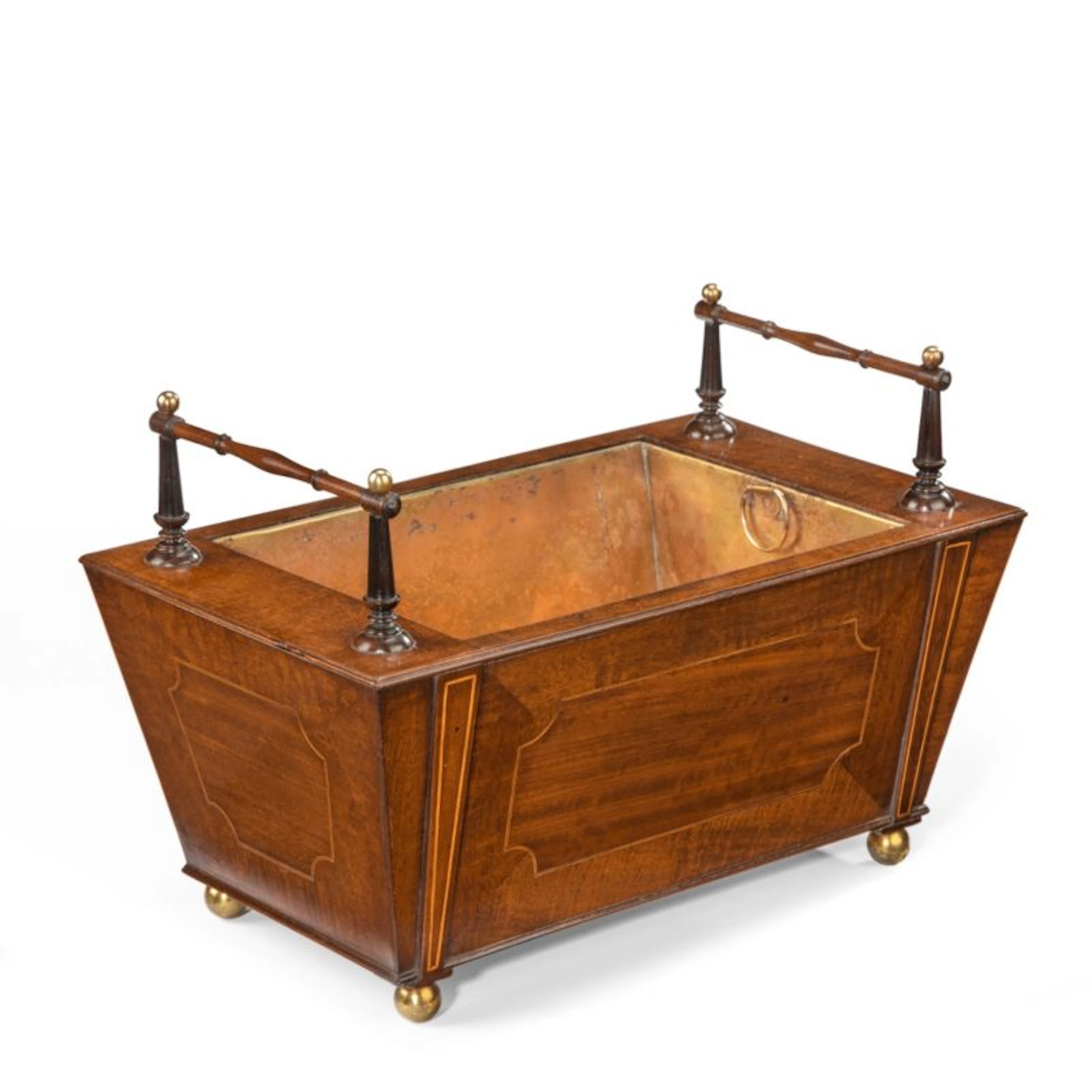 A George III fiddleback mahogany table jardinière