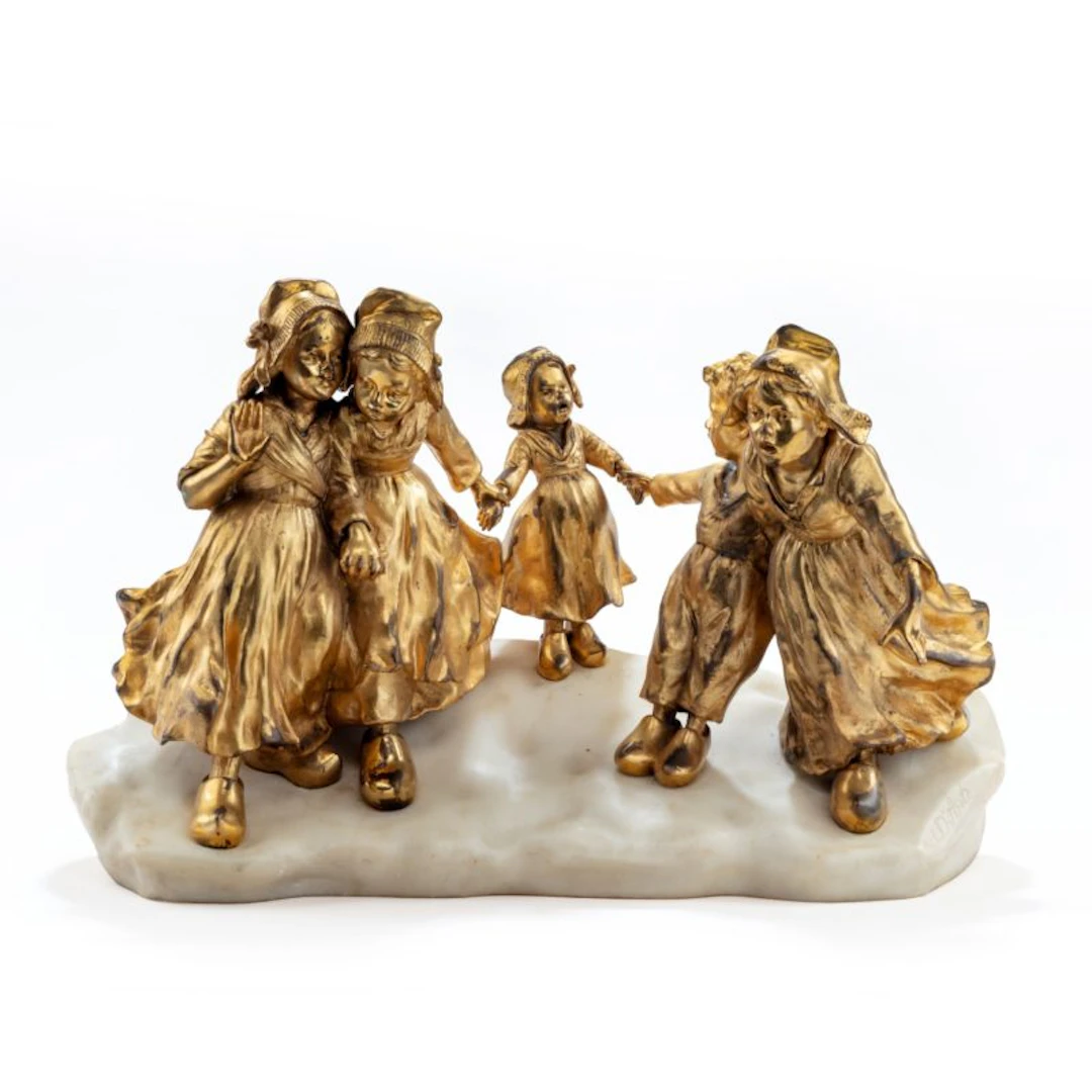 A charming gilt bronze group of Dutch children by Guiseppe or Joseph