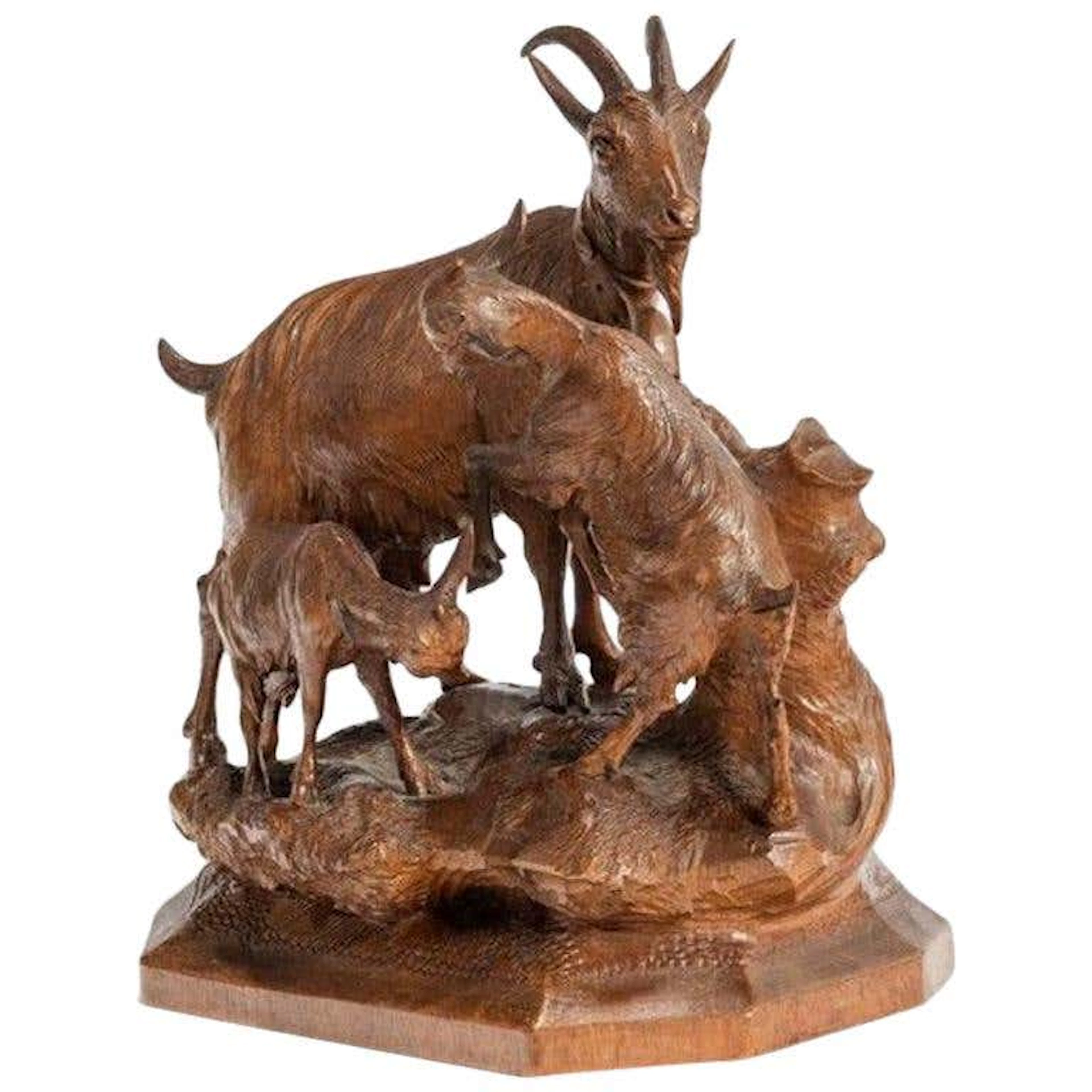 A Black Forest wood carving of a mountain goat