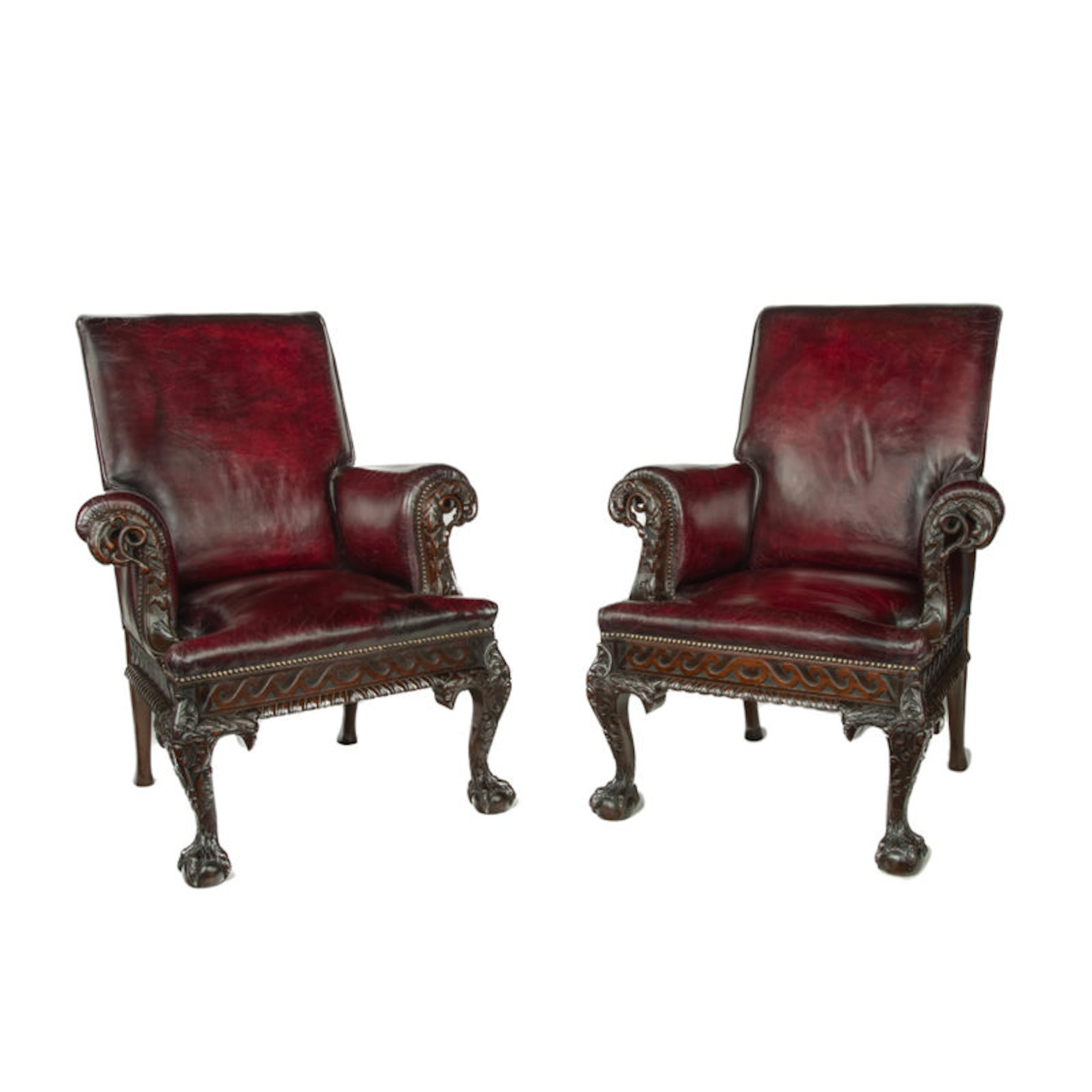 A fine pair of generous late Victorian mahogany eagle armchairs