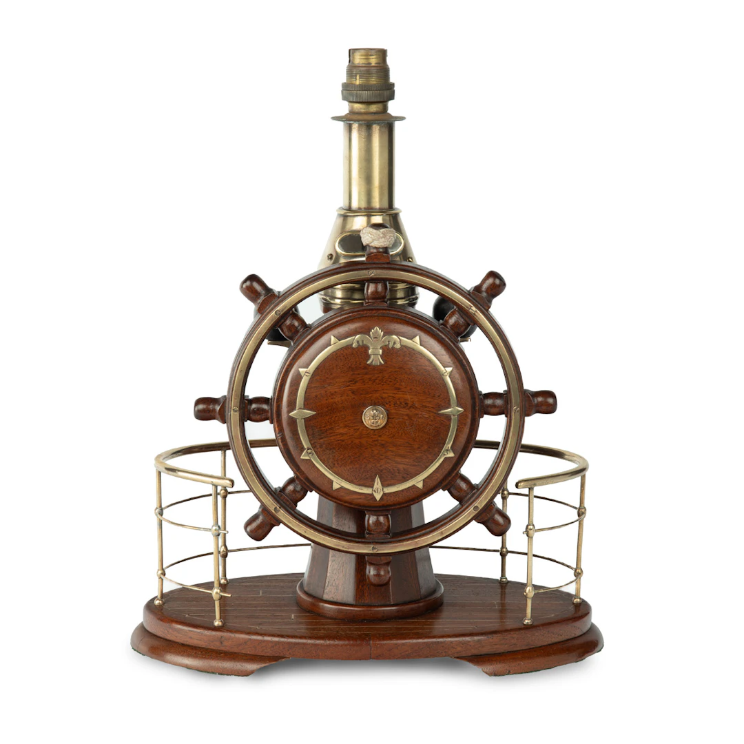 A novelty maritime teak, mahogany and brass table lamp