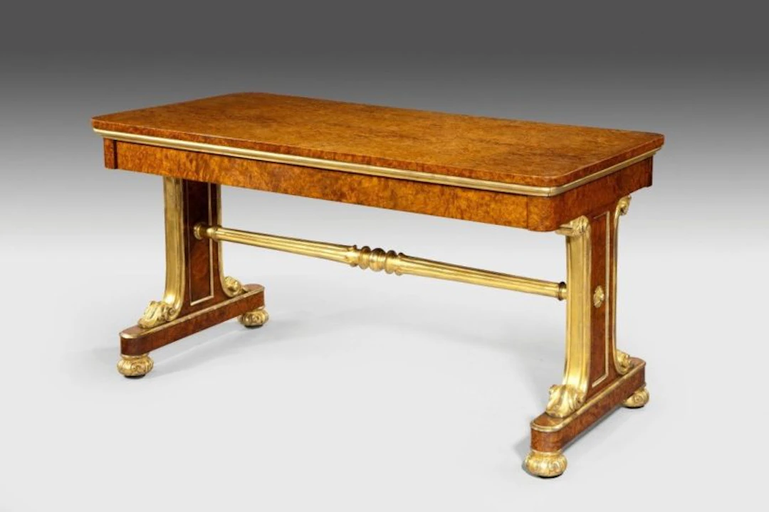Amboyna and gilt library table attributed to Morel and Seddon