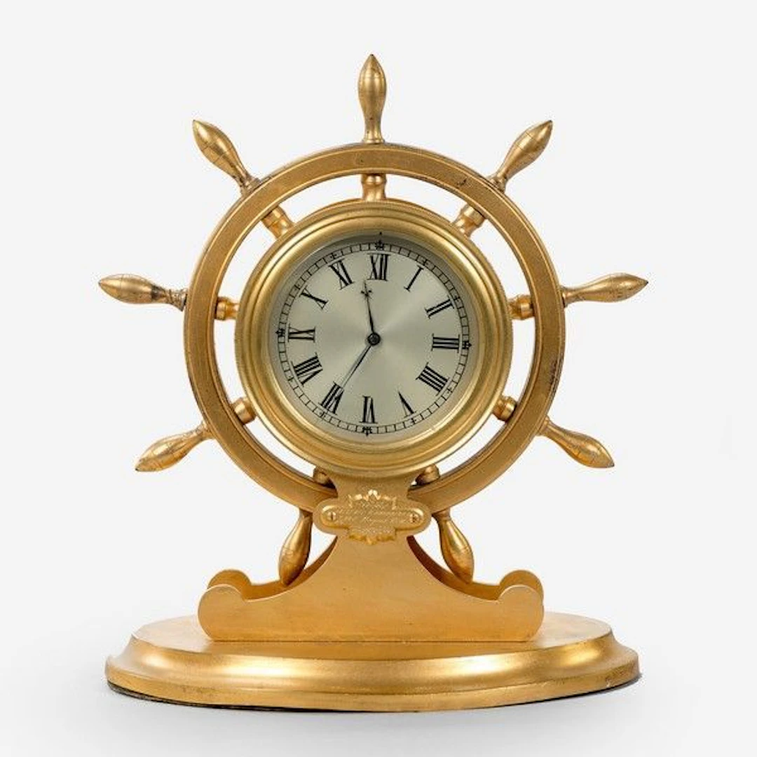English gilt metal ship’s wheel desk clock