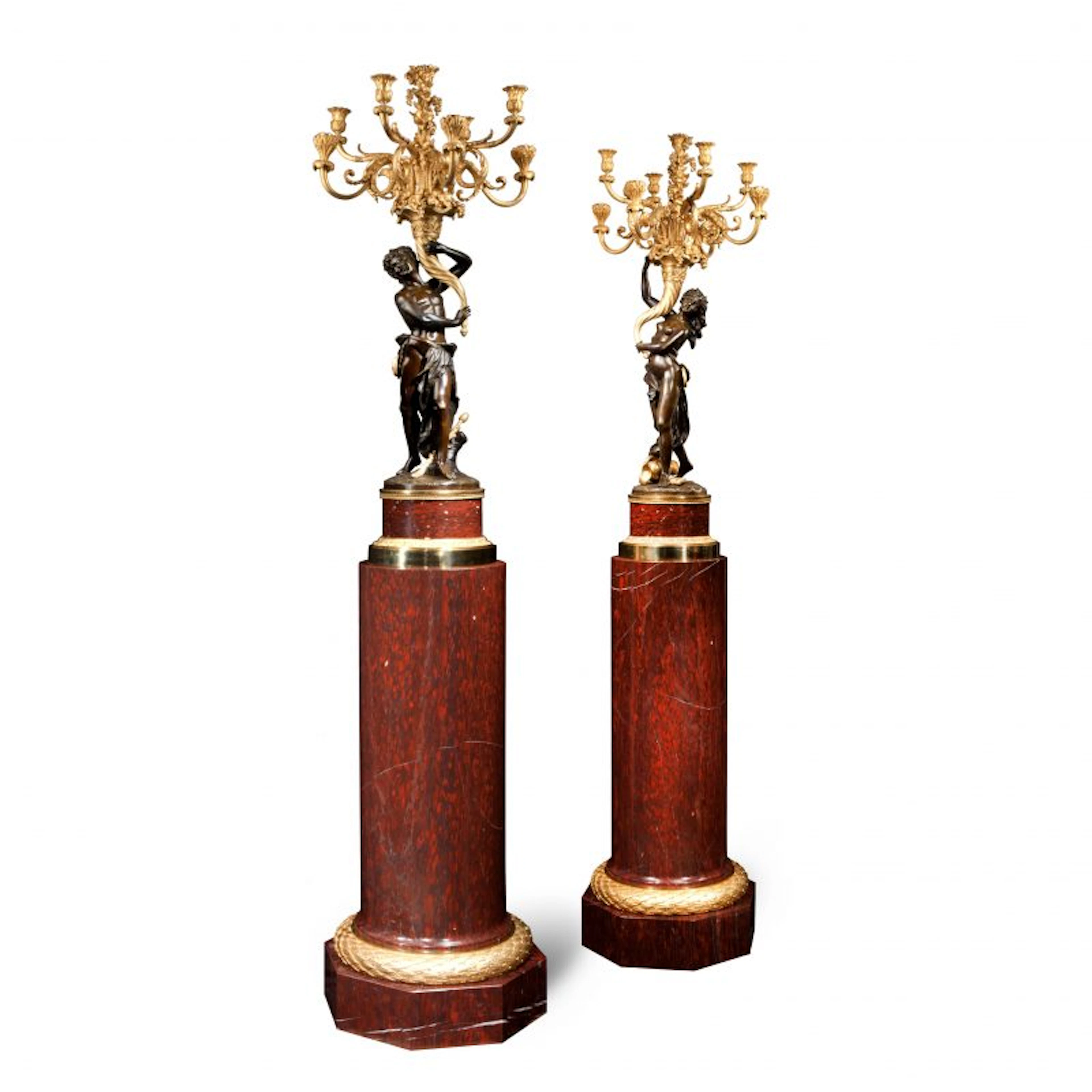 A Magnificent Pair of Louis XVI Candelabra after Clodion