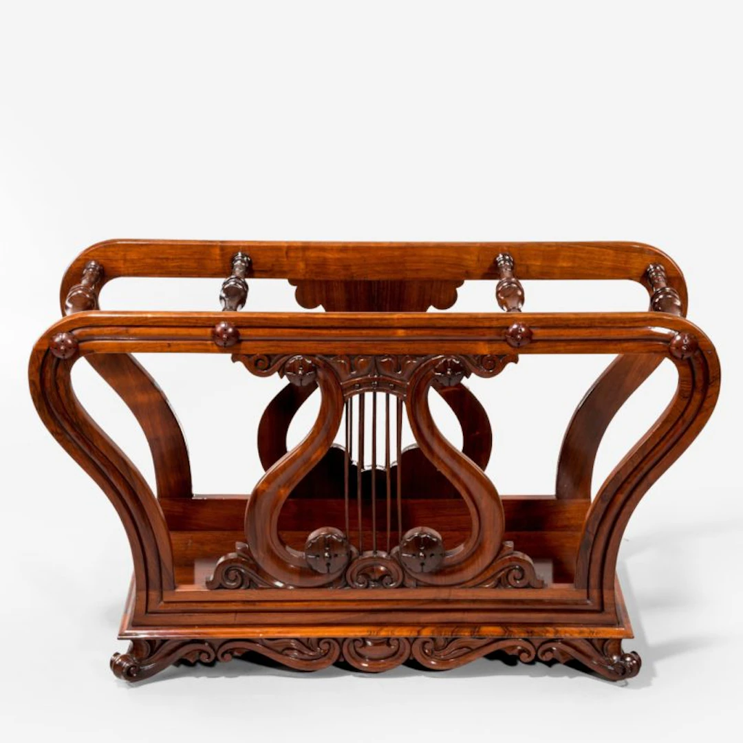 An unusual late Regency rosewood music roll holder