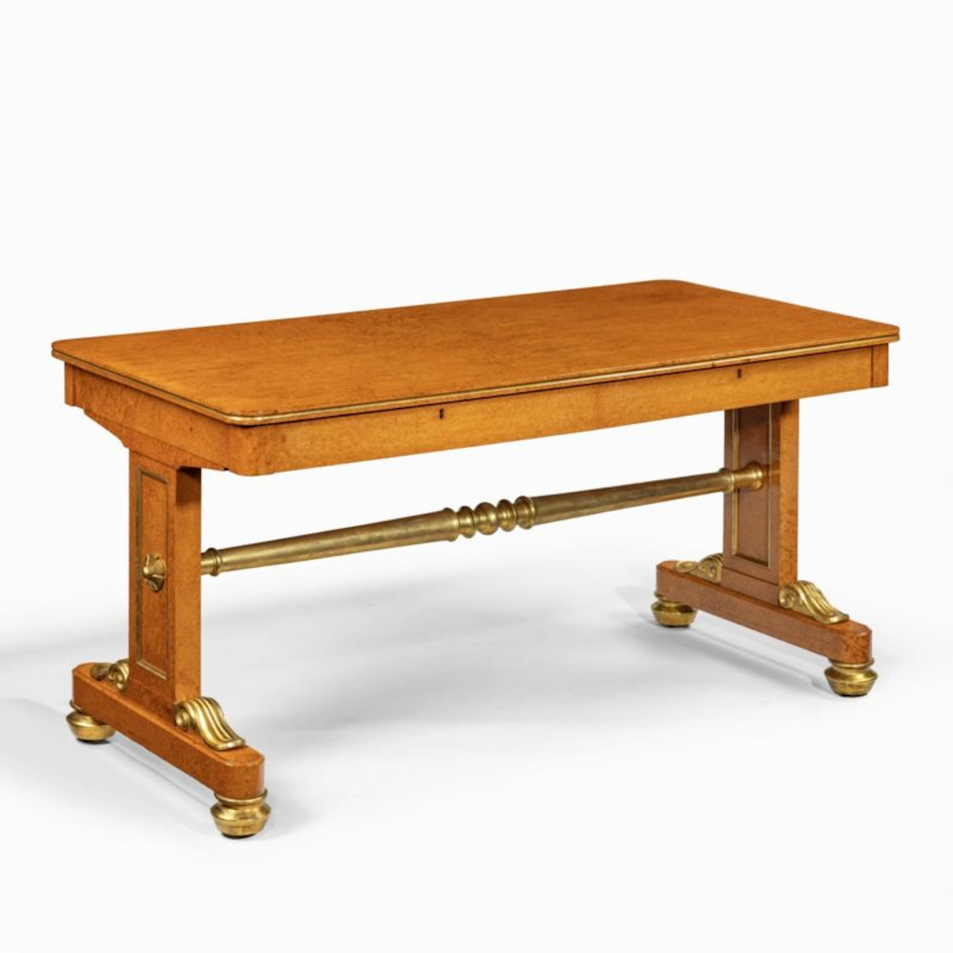 A Regency amboyna and gilt library table attributed to Seddon and Morel