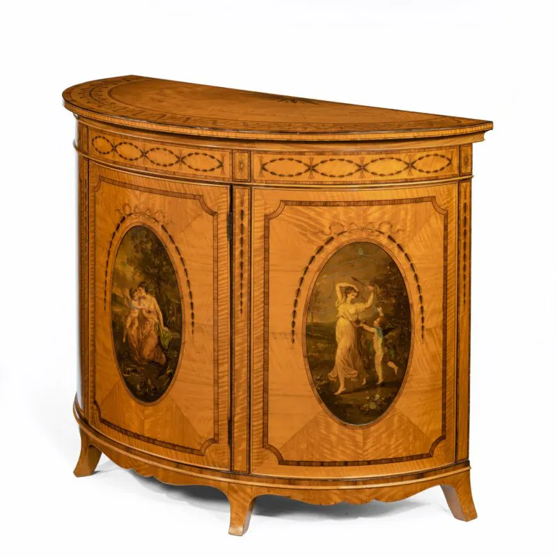 A fine Victorian Sheraton revival West Indian satinwood demi lune ...