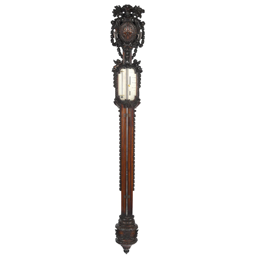 Lord Vernon’s Sudbury Hall lime wood barometer, by J. Braund after