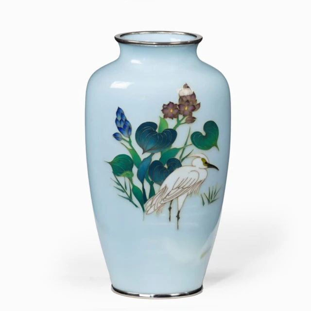 A small light blue cloisonne enamel vase with an egret