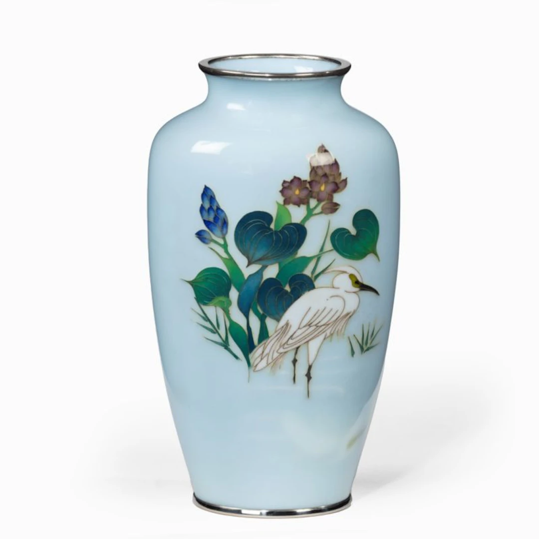 A small light blue cloisonne enamel vase with an egret