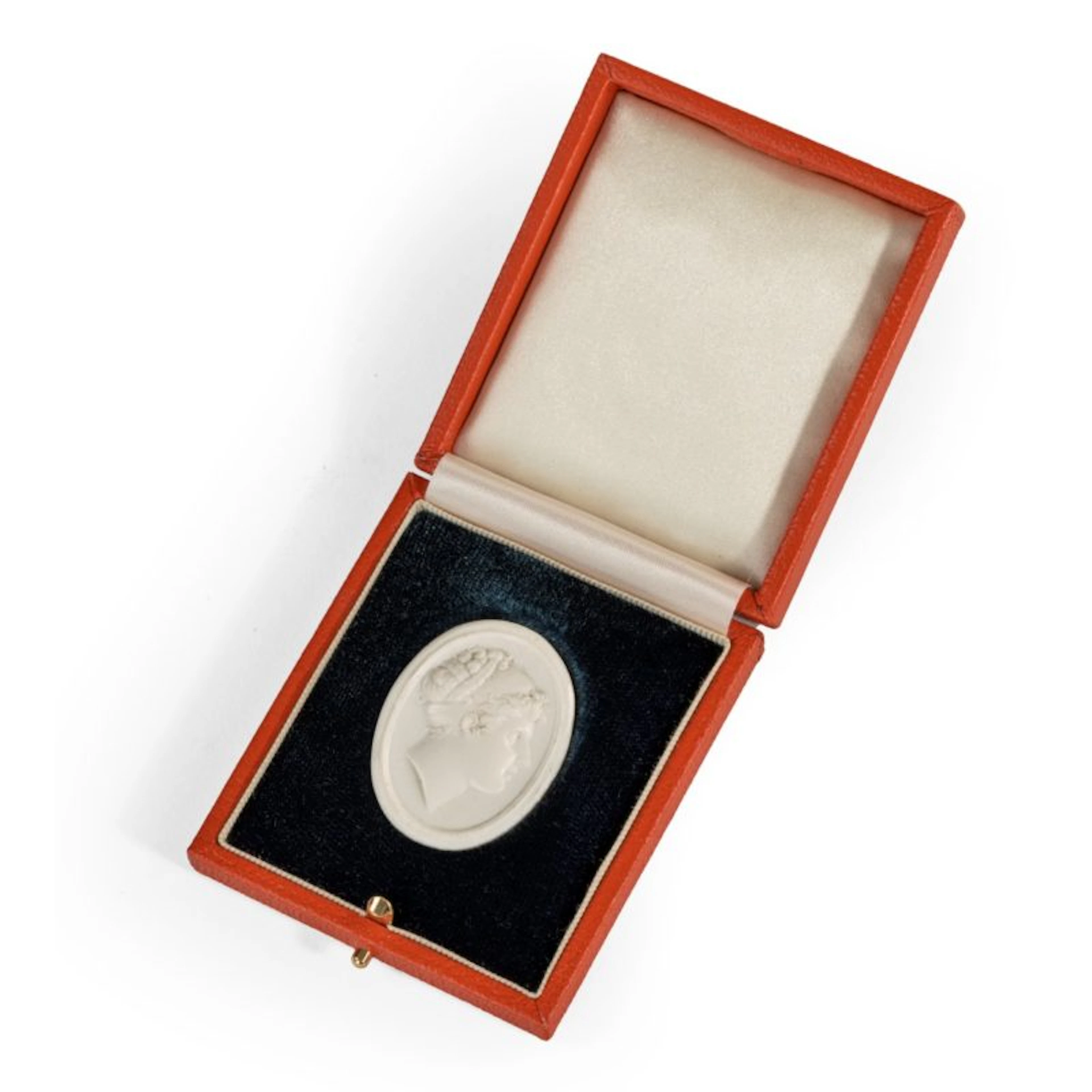 A white vitreous paste cameo of Emma, Lady Hamilton, attributed to