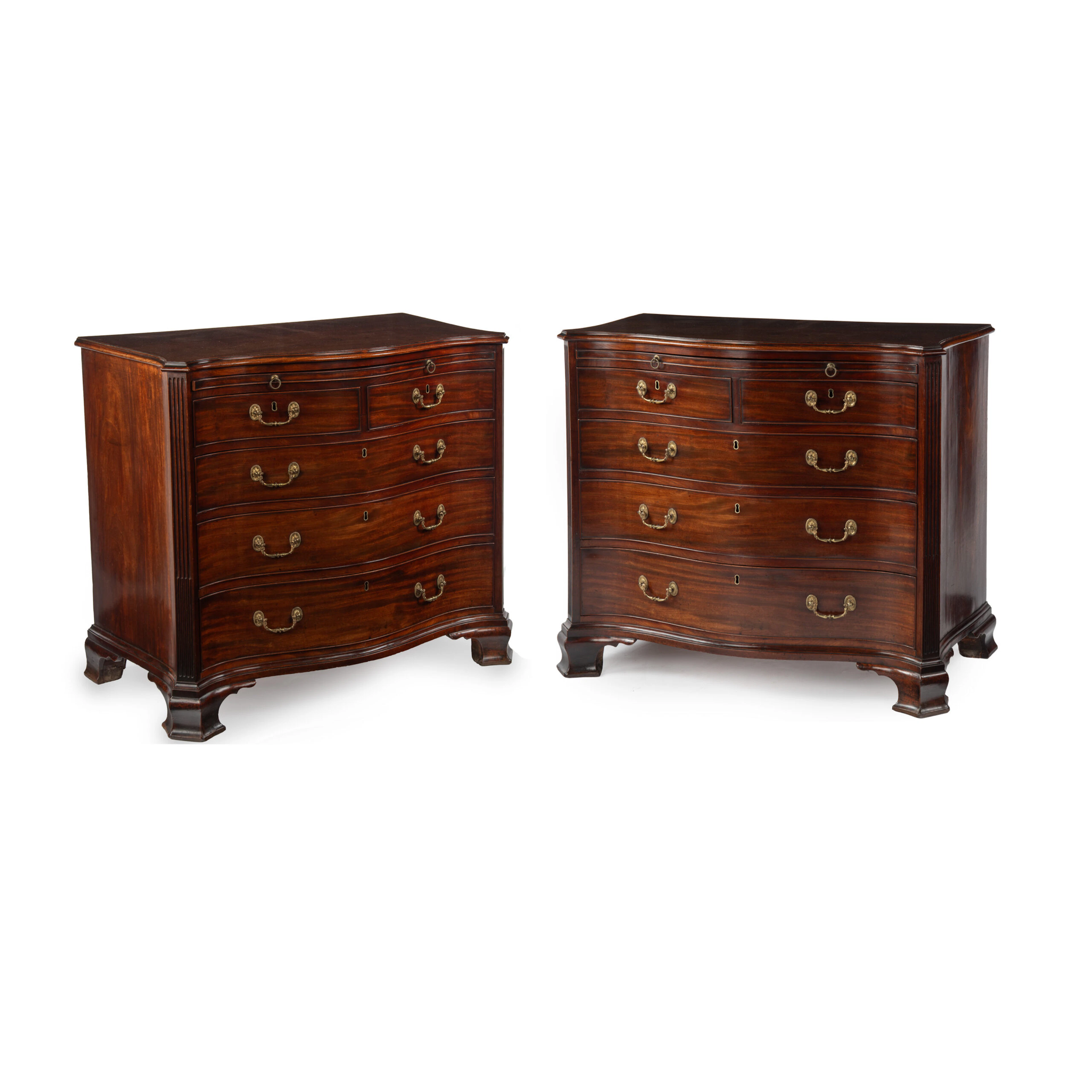 An Extremely Fine Pair of George III Period Mahogany Serpentine Chests