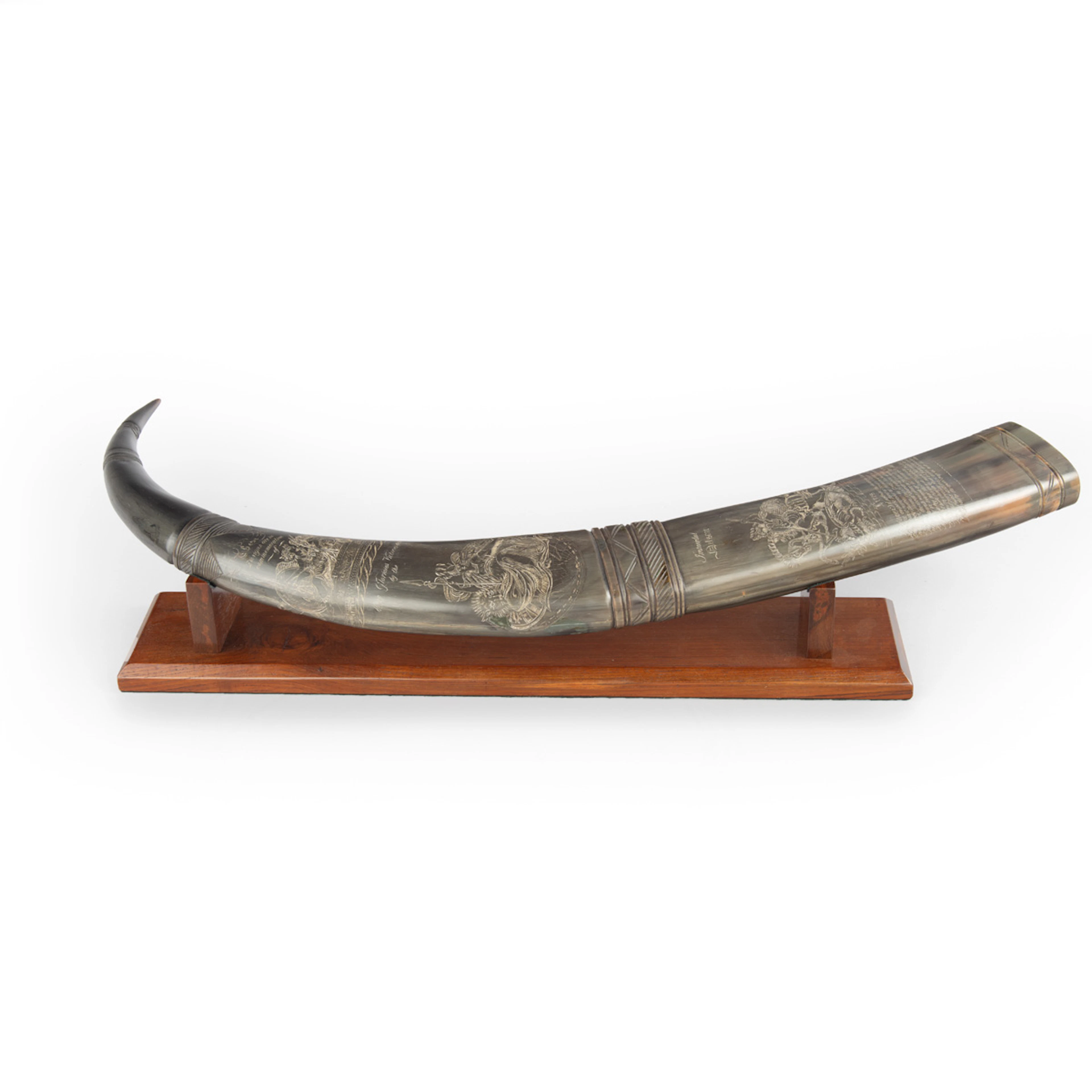 A rare scrimshaw decorated horn signed by C.H. Wood