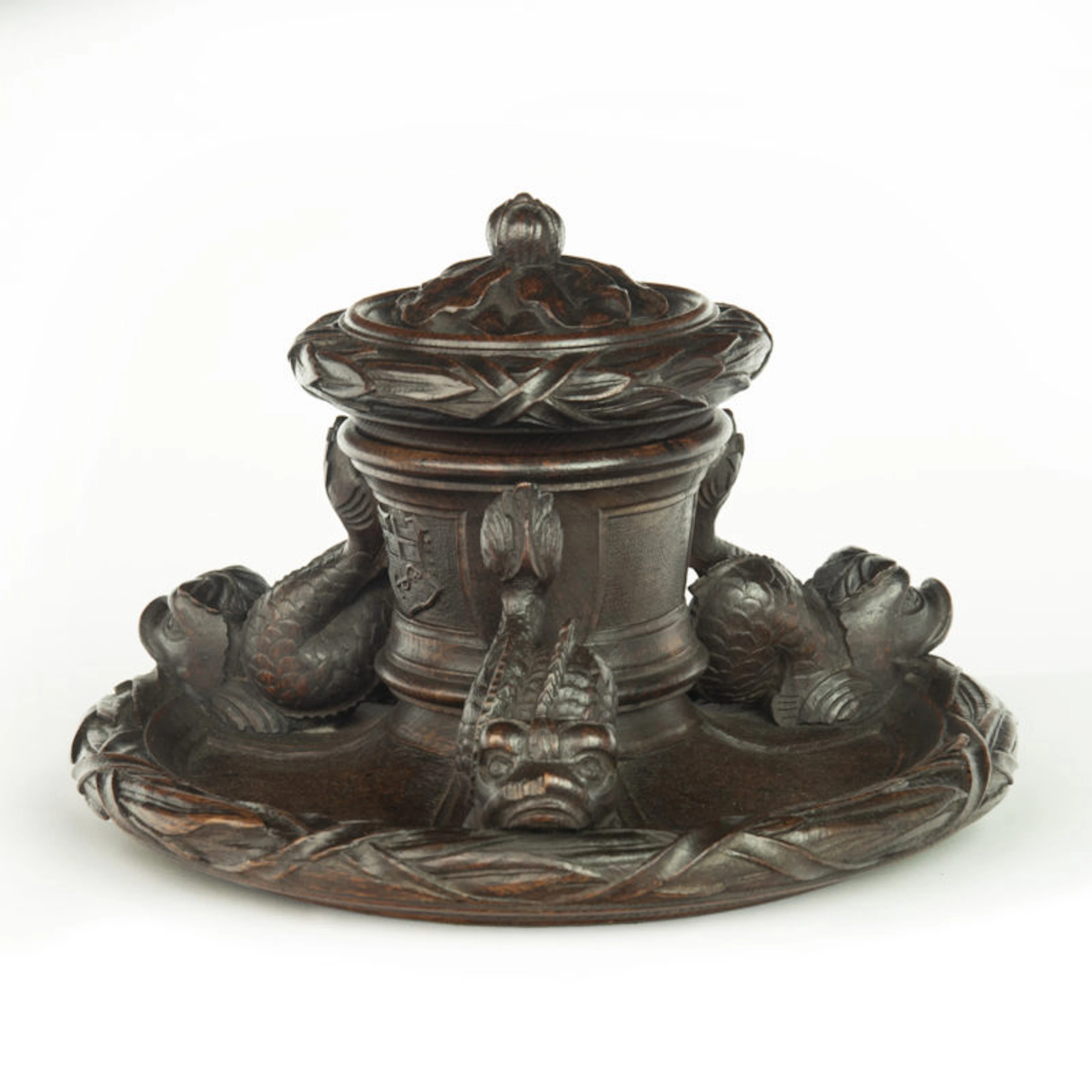 An oak inkwell carved from Lutine timber, dated 1799