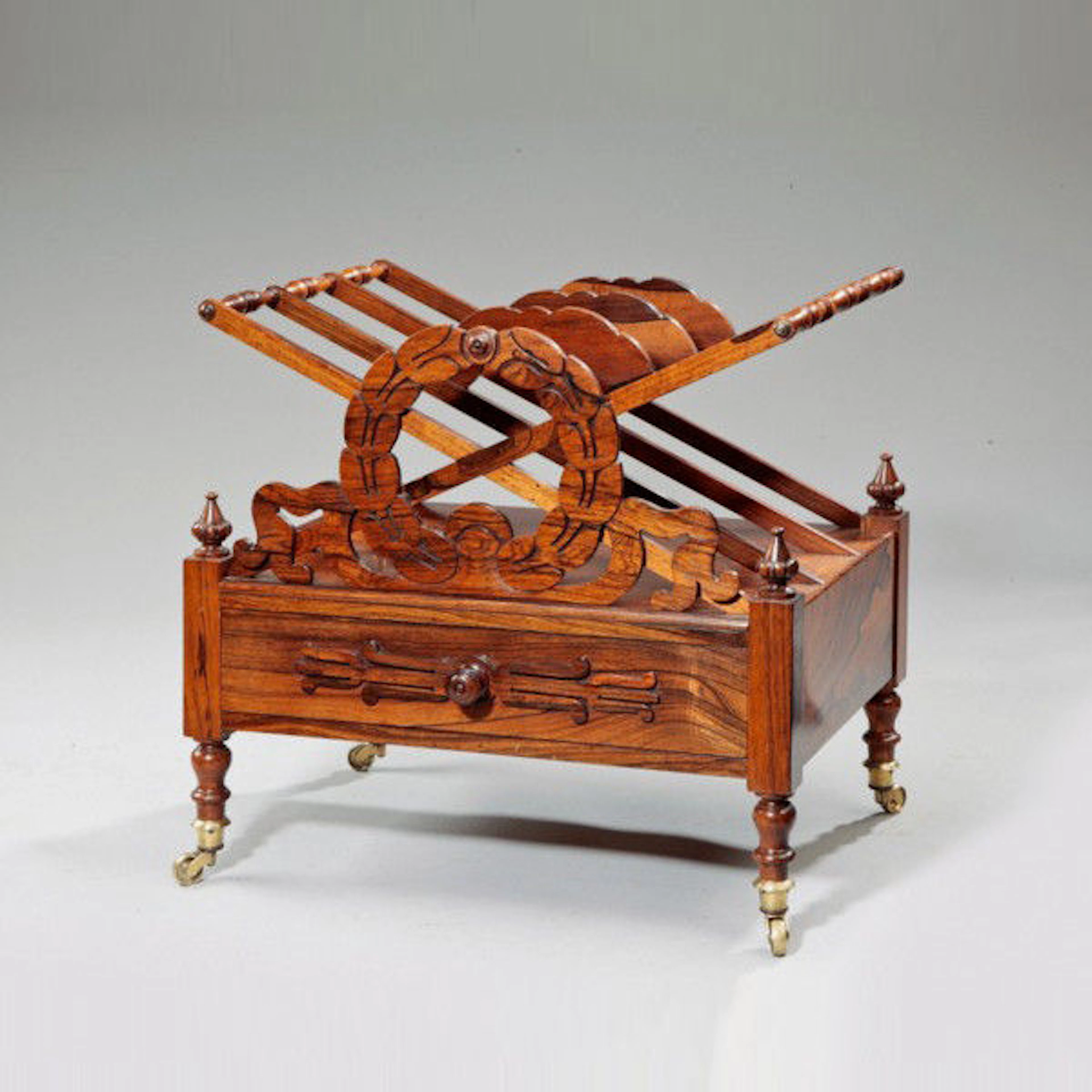 A Regency rosewood Canterbury in the manner of Loudon