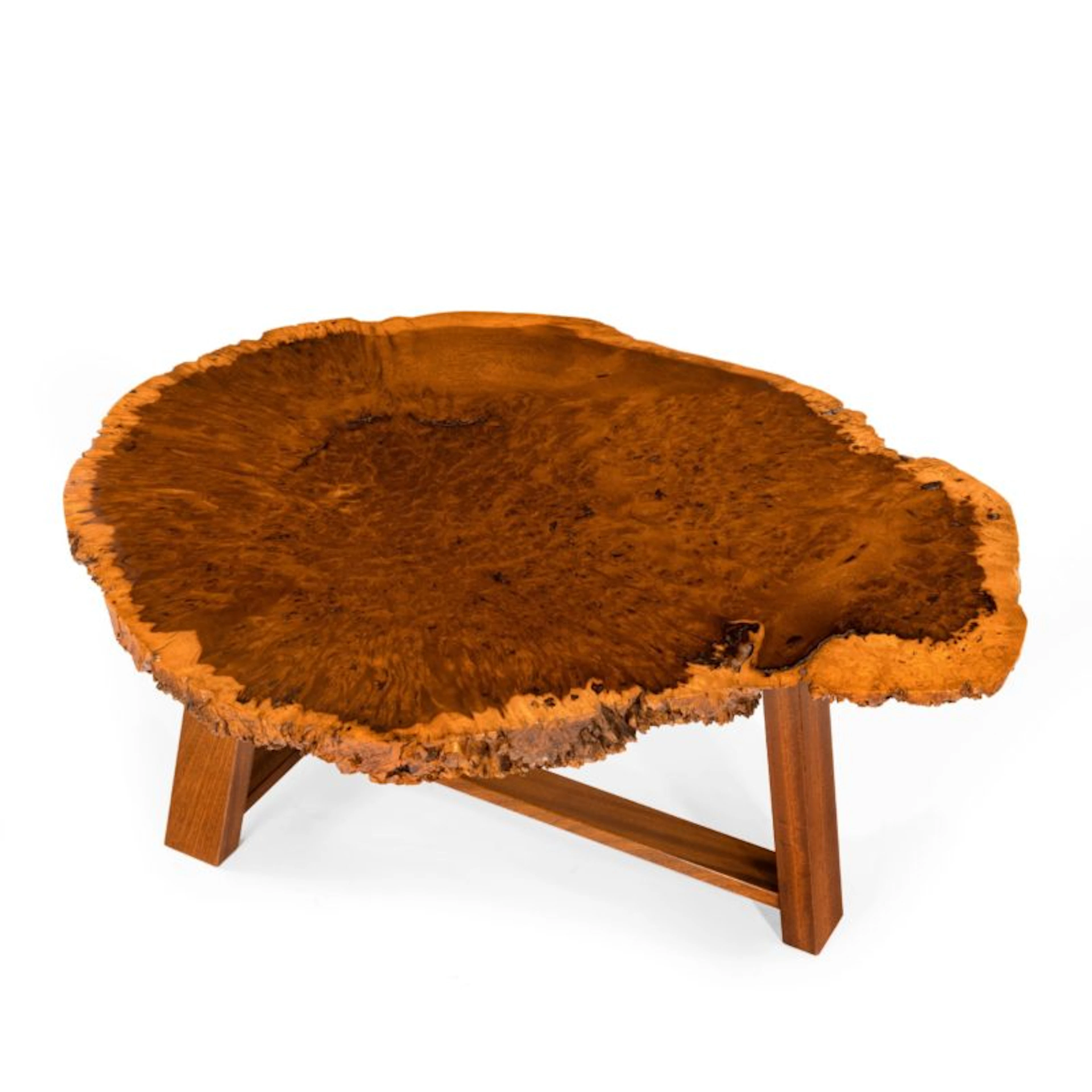 A stylish polished Amboyna Coffee Table