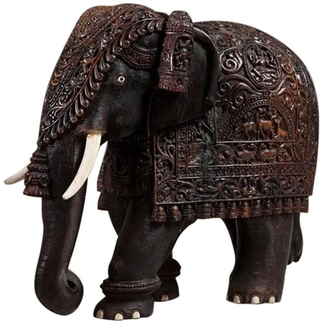 Indian carved hardwood elephant with bone tusks and toe nails