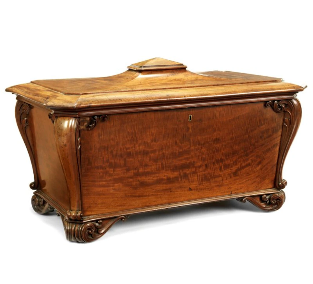 A large William IV fiddleback mahogany cellaret