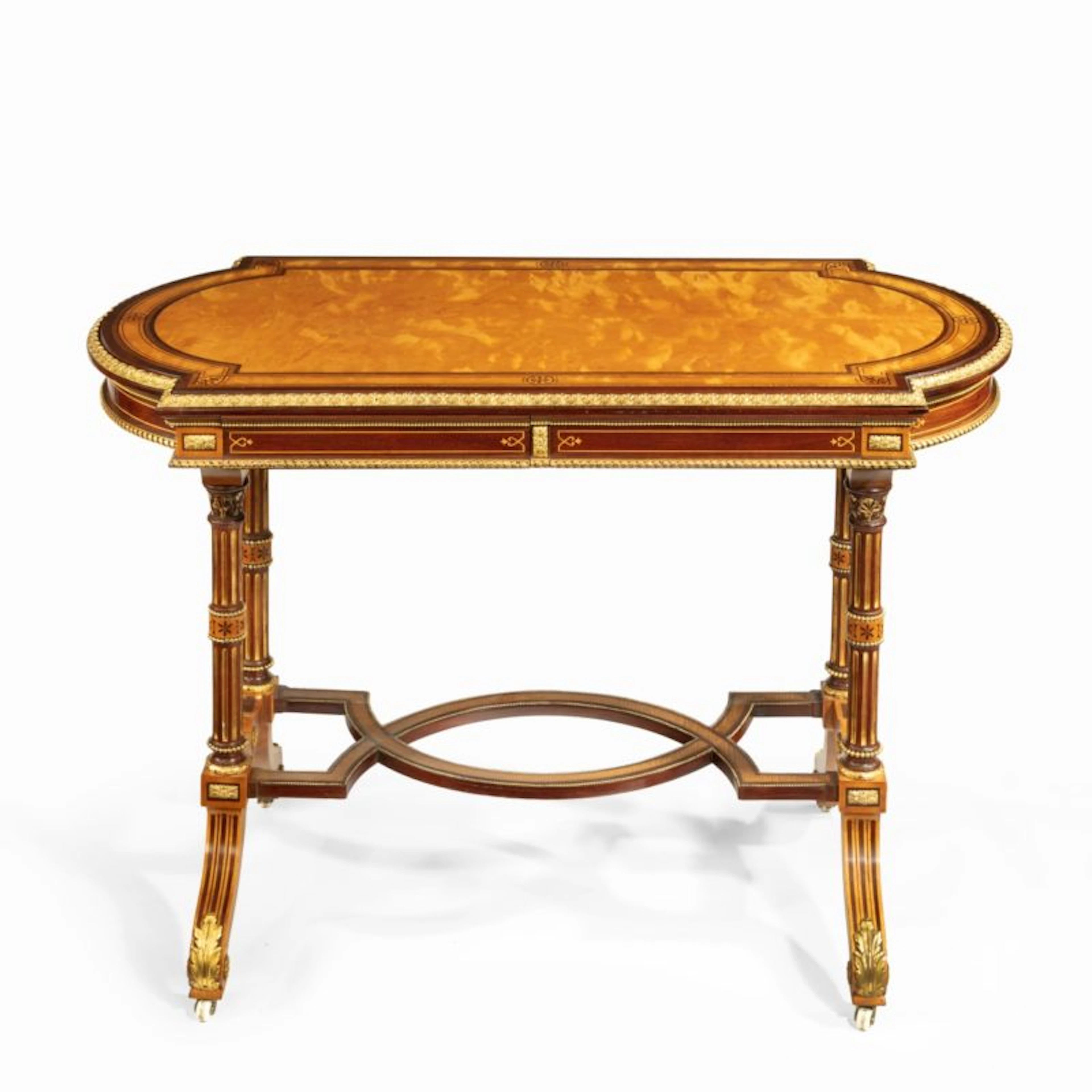 A Victorian fine satinwood ladies’ writing table attributed to Holland and Sons