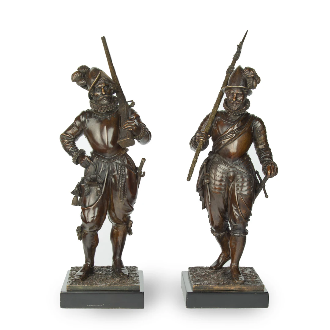A pair of bronze standing figures of Spanish explorer and Conquistador