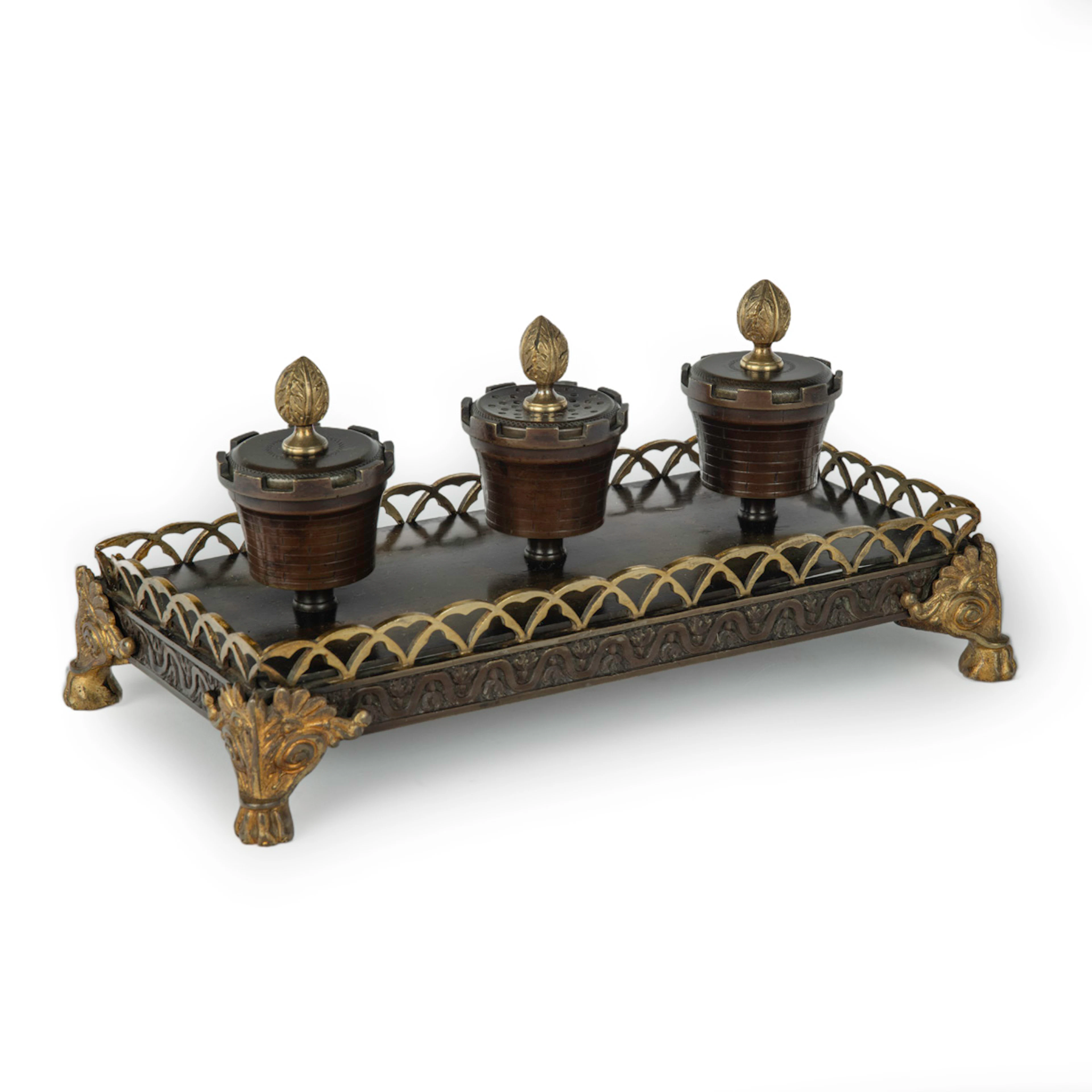 A Louis Philippe bronze and ormolu desk set