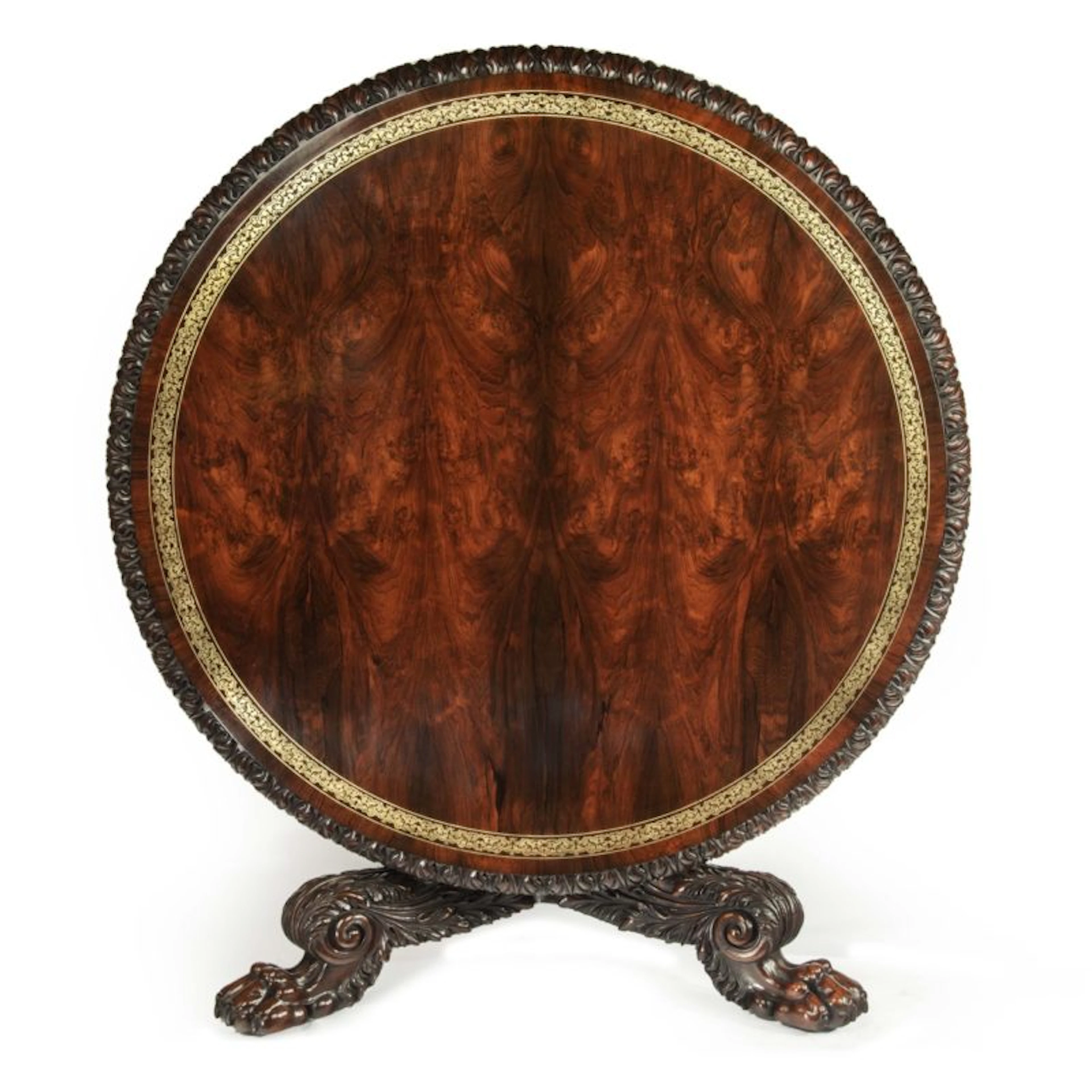 A large George IV brass inlaid Gonçalo alves centre table attributed to Gillows