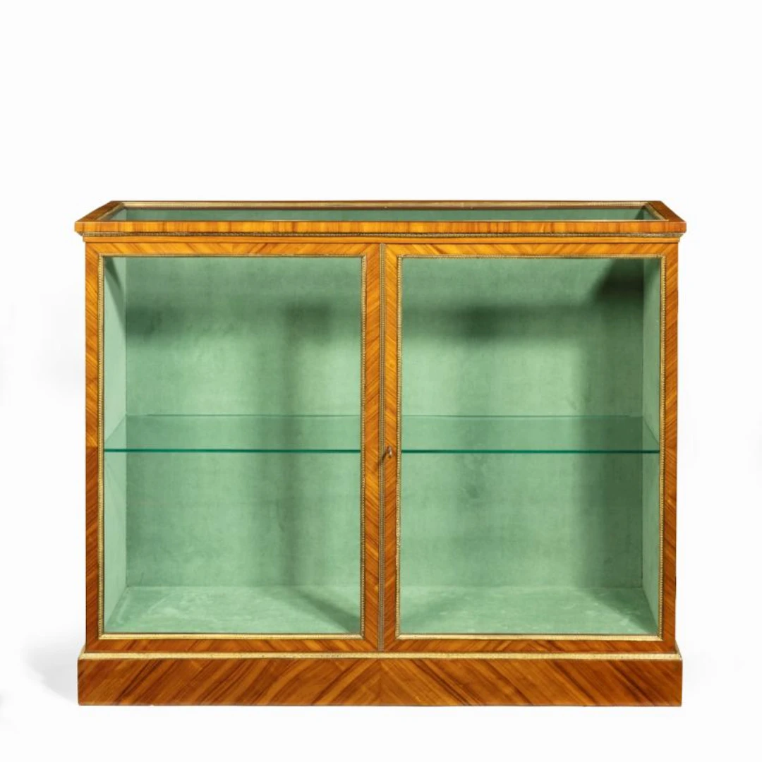 A Victorian kingwood display cabinet in French taste