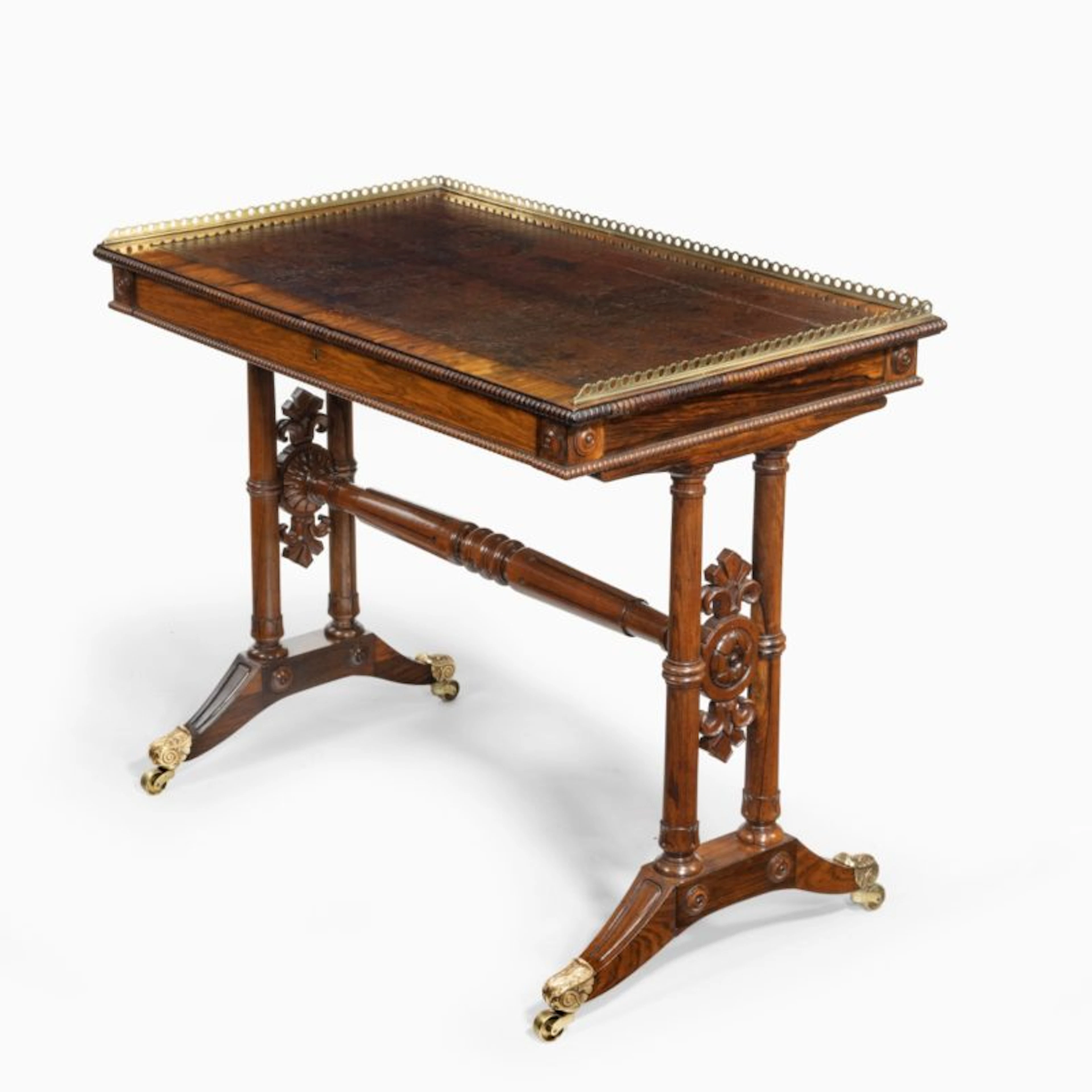 A William IV rosewood free-standing end support table attributed to Gillows