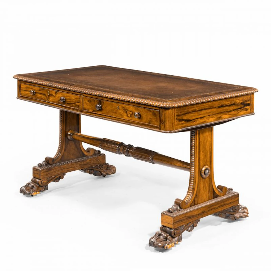A late Regency rosewood free standing library table by James Winter