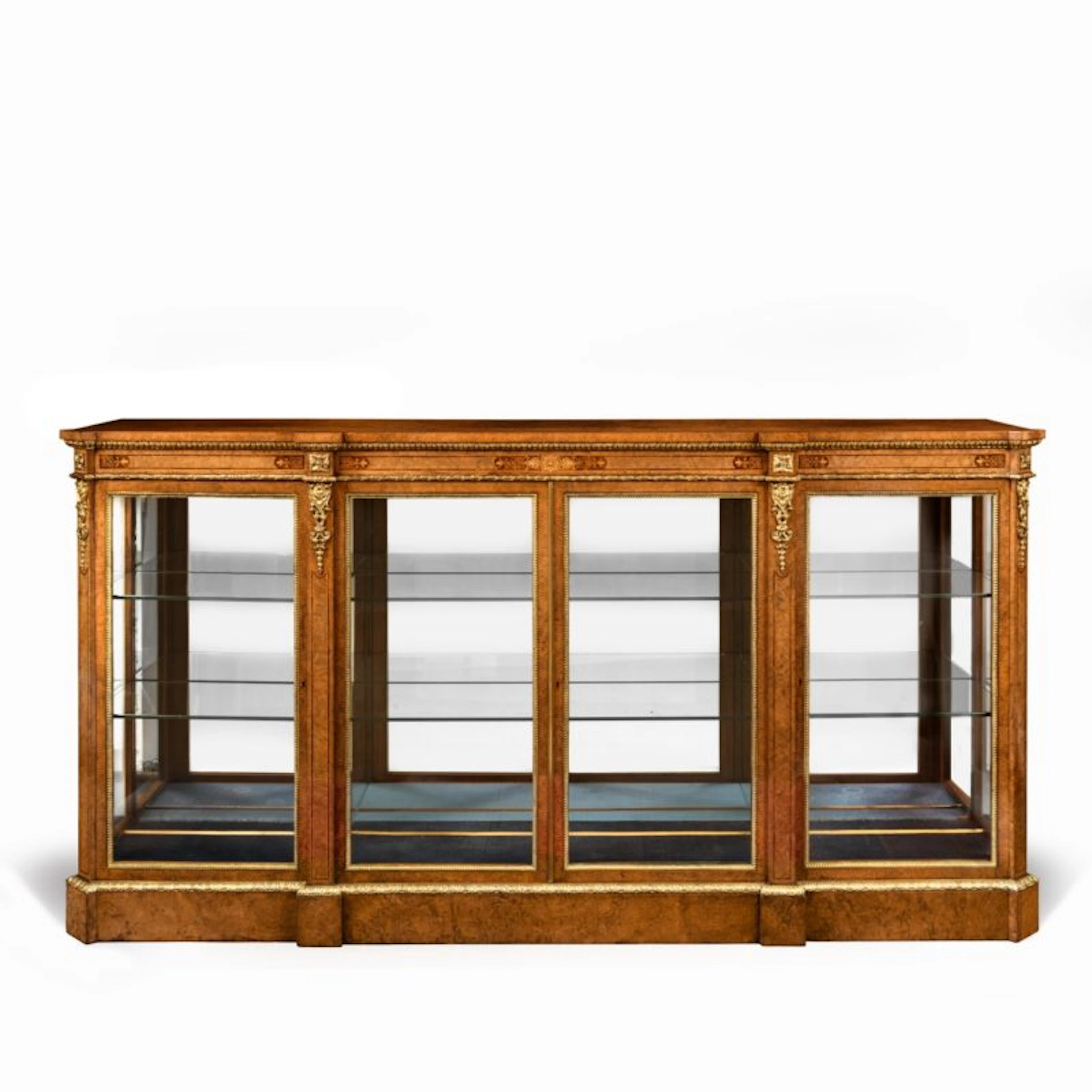 A mid Victorian burr walnut display cabinet
