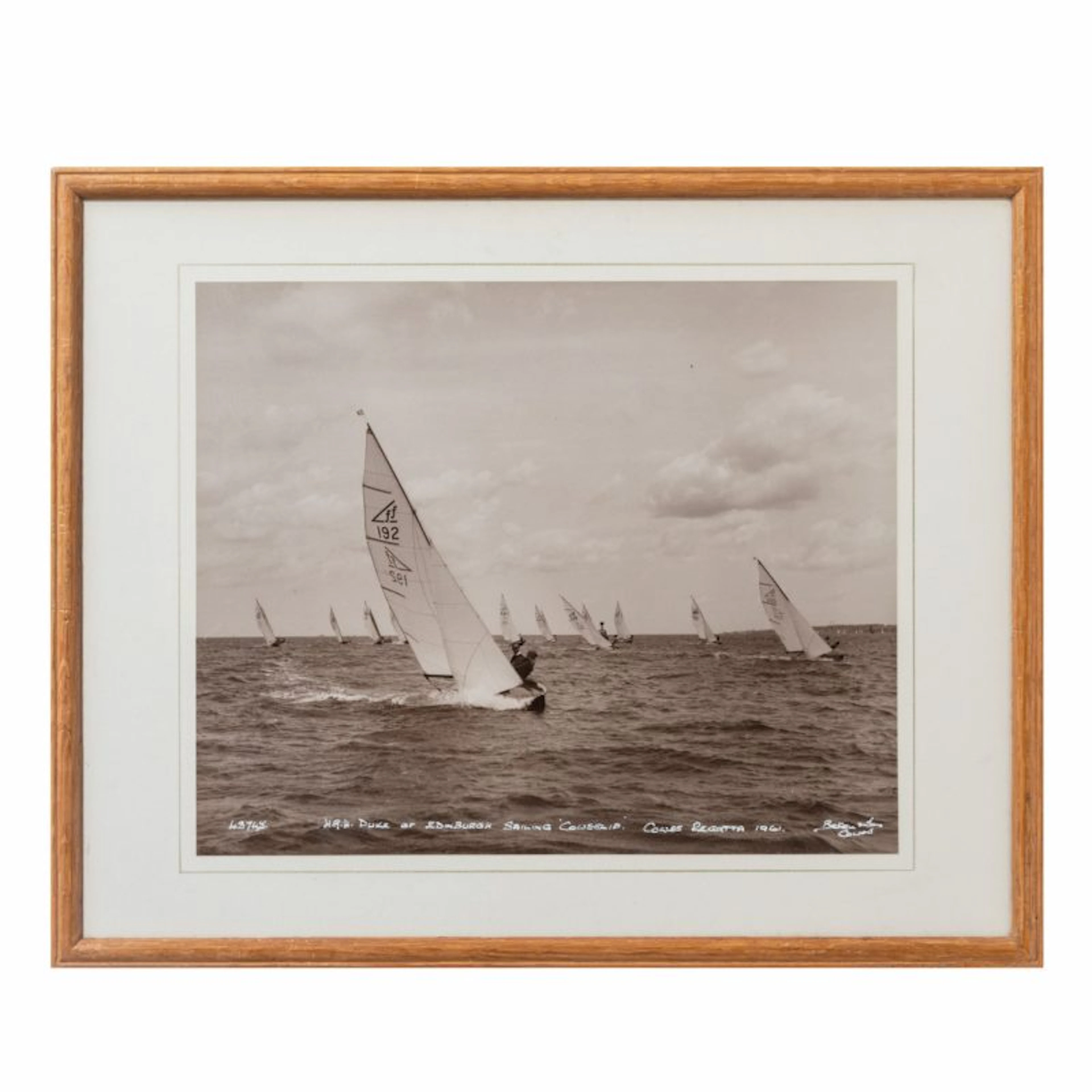 An Original Beken photograph of HRH duke of Edinburgh leading the fleet