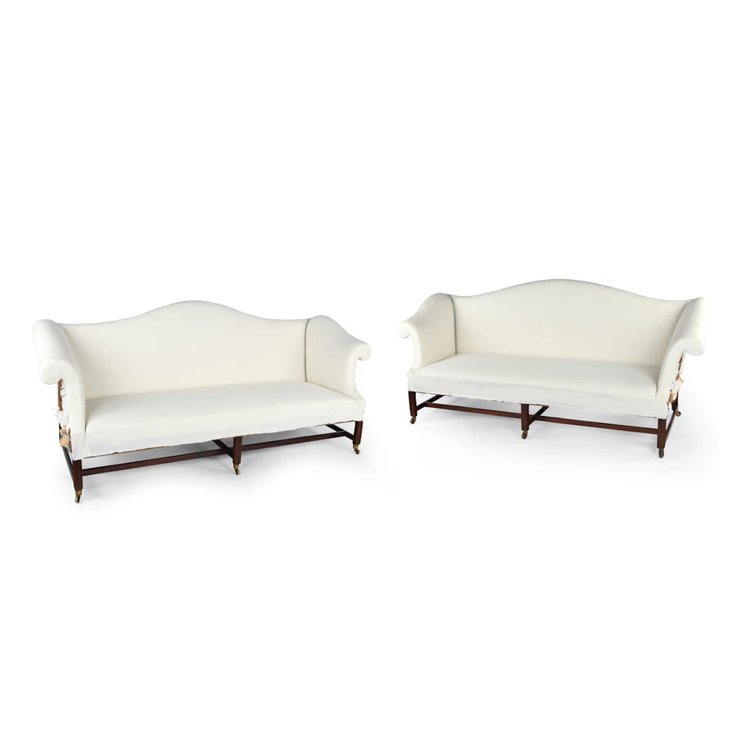 A pair of Georgian mahogany sofas from Powderham Castle sofas/settees
